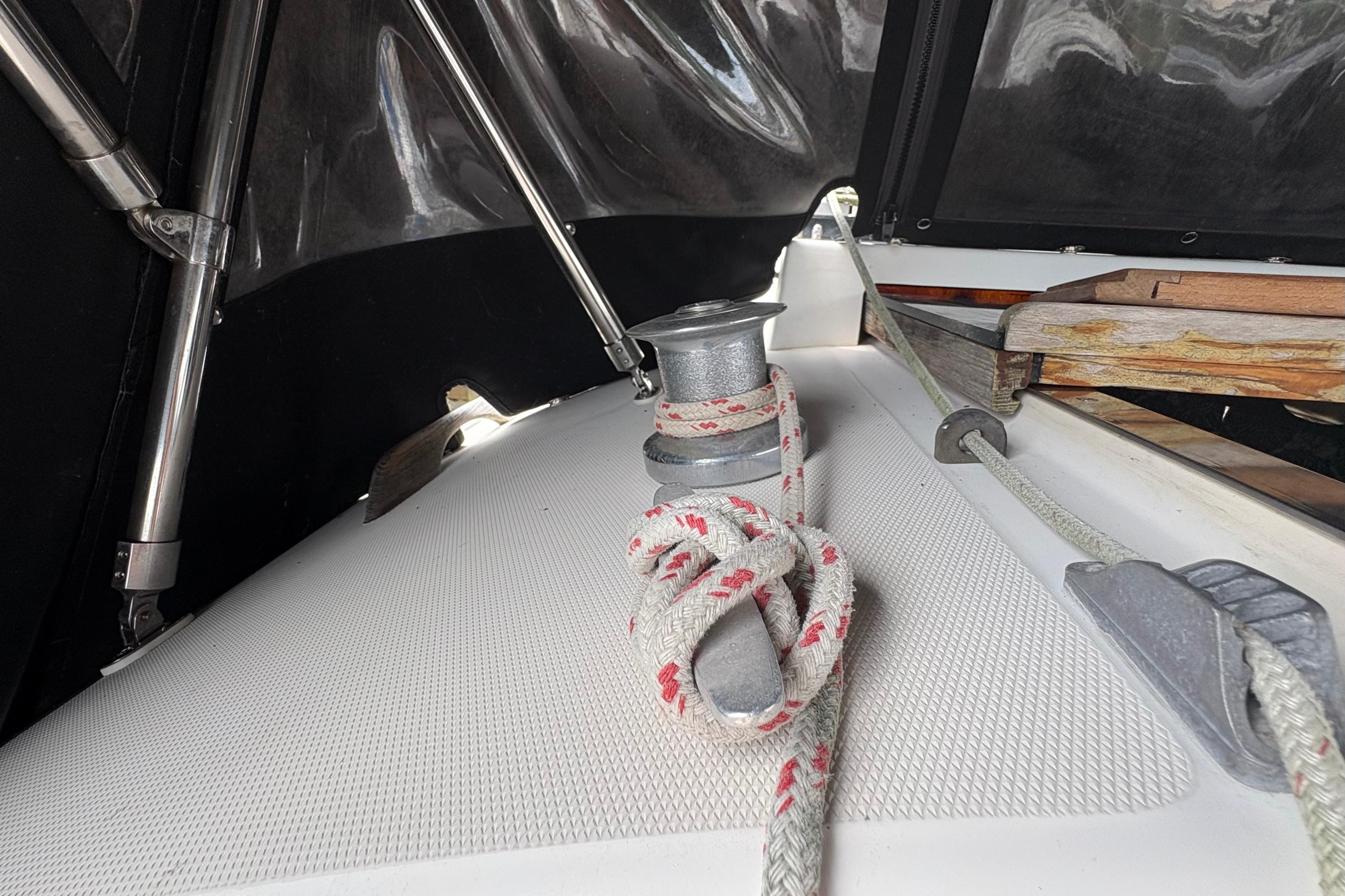 Deck of 1981 Sabre 31 sailboat with winch and rope detail.