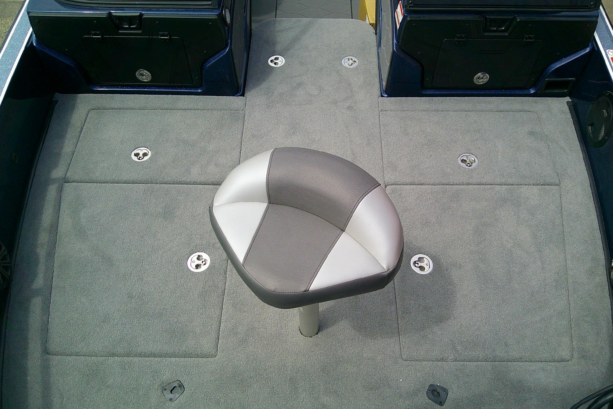 Fishing deck of 2026 Nitro ZV21 Pro with swivel seat and storage compartments.