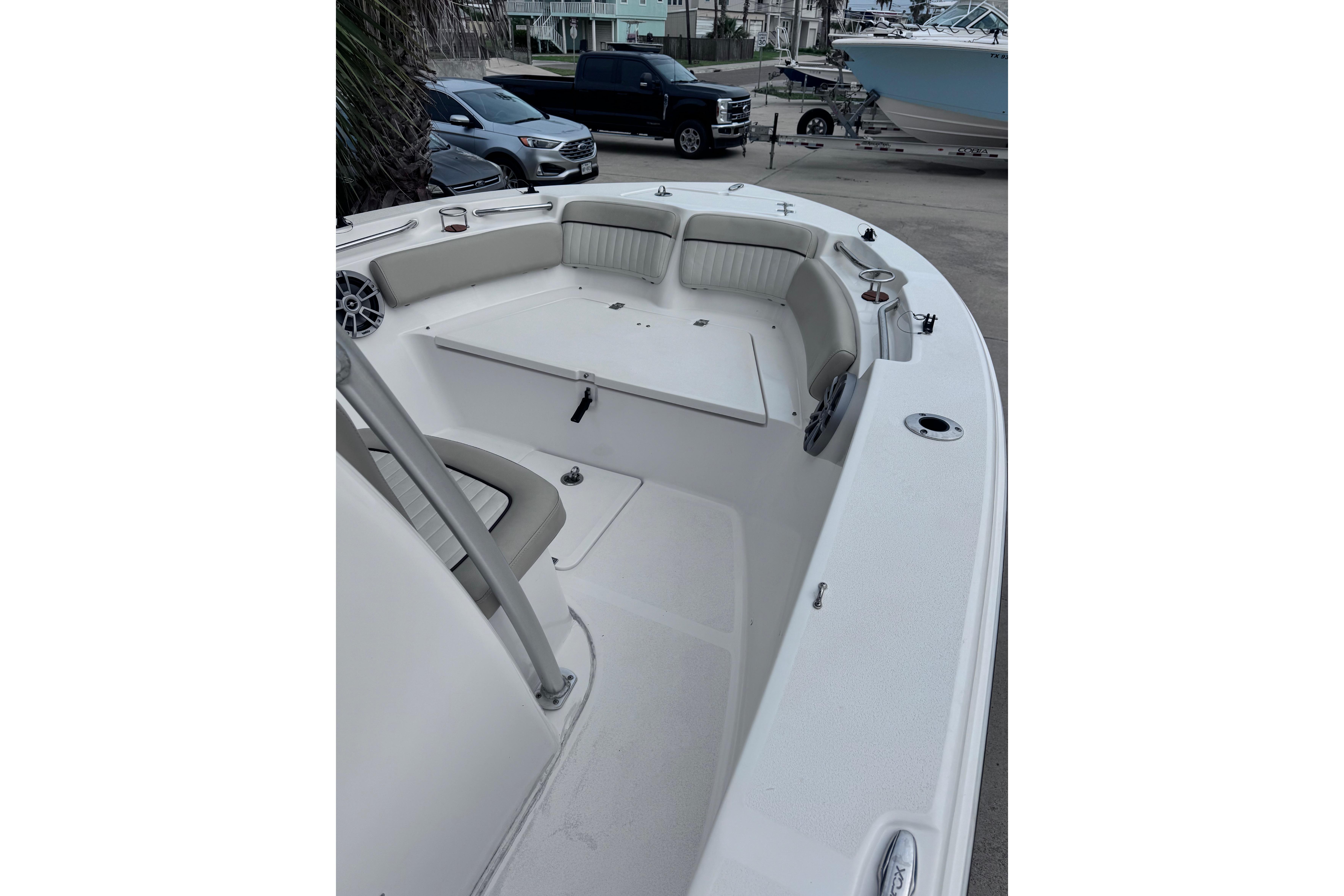 2018 Sea Fox 206 Commander boat interior with seating and storage compartments.