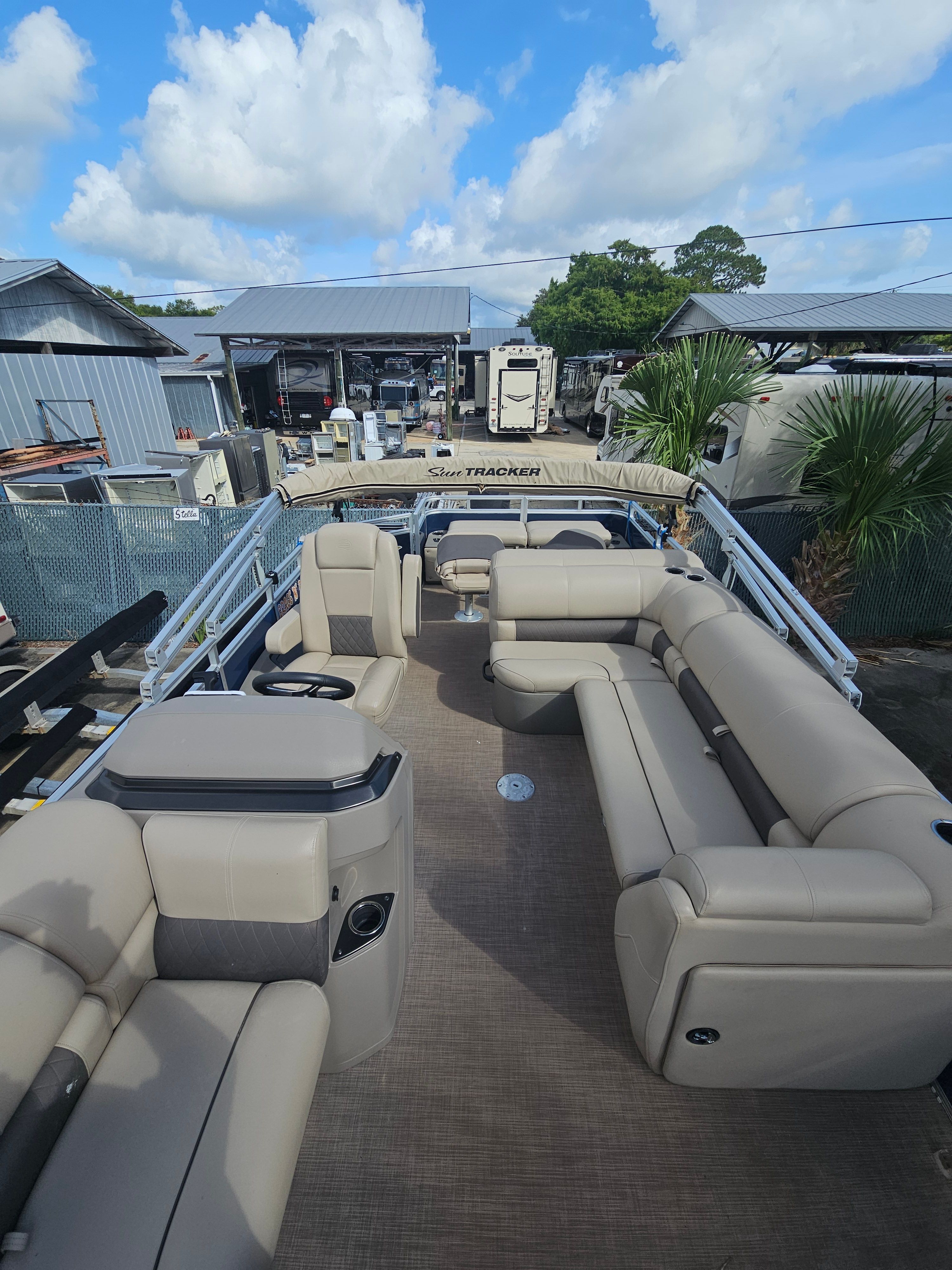 2024 Sun Tracker Fishin' Barge 22 DLX with spacious interior and comfortable seating.