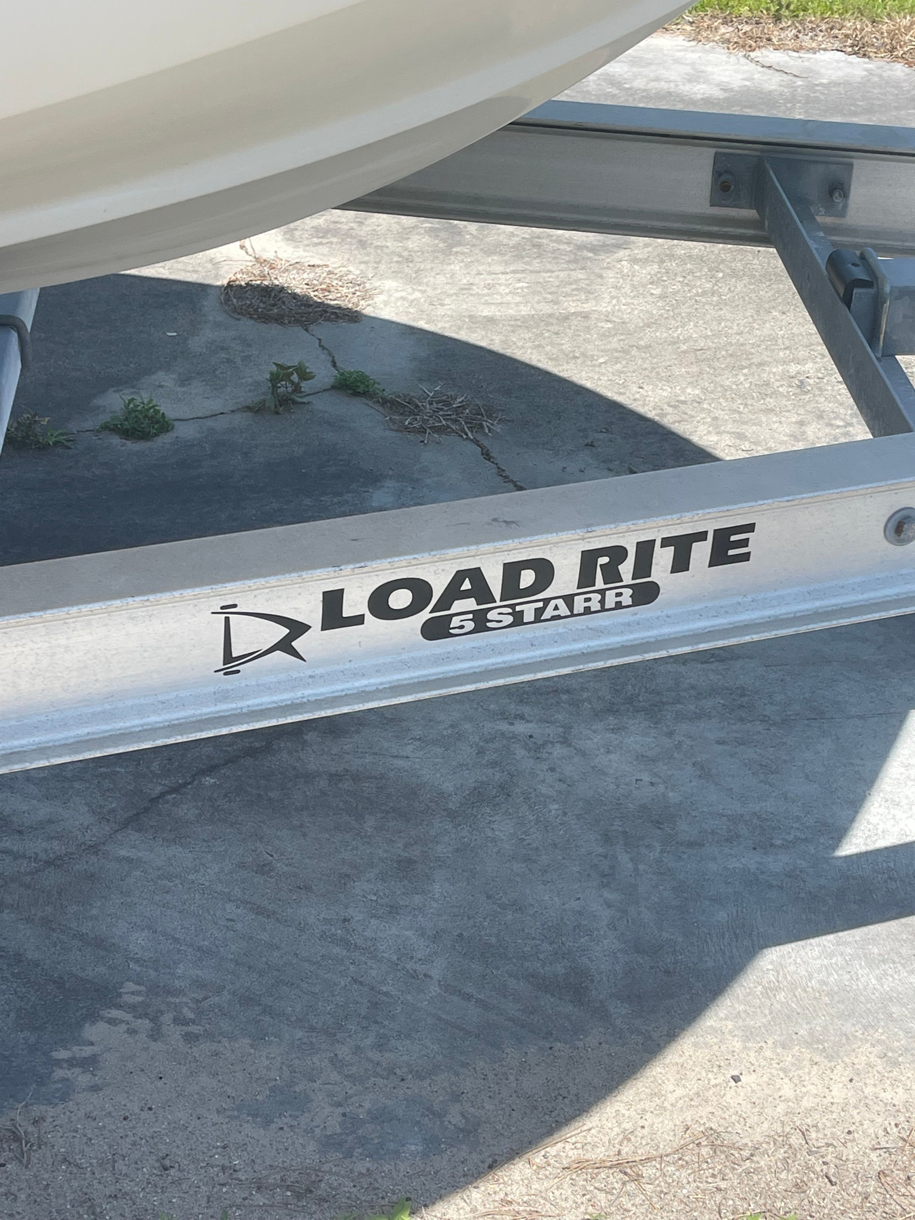 A boat on a Load Rite 5 Starr trailer.
