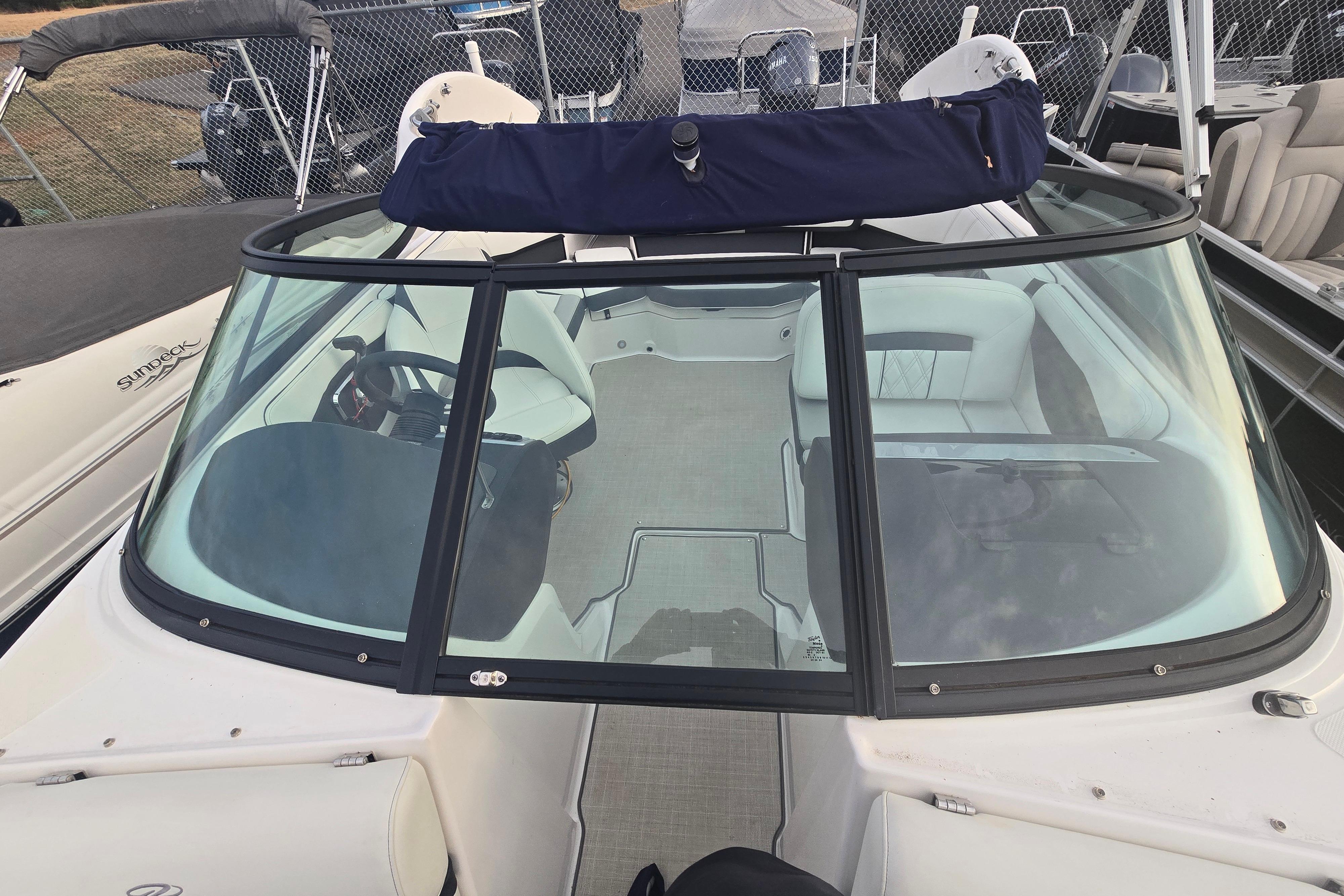 2022 Regal 2000 ES boat interior with windshield and seating, docked at marina.