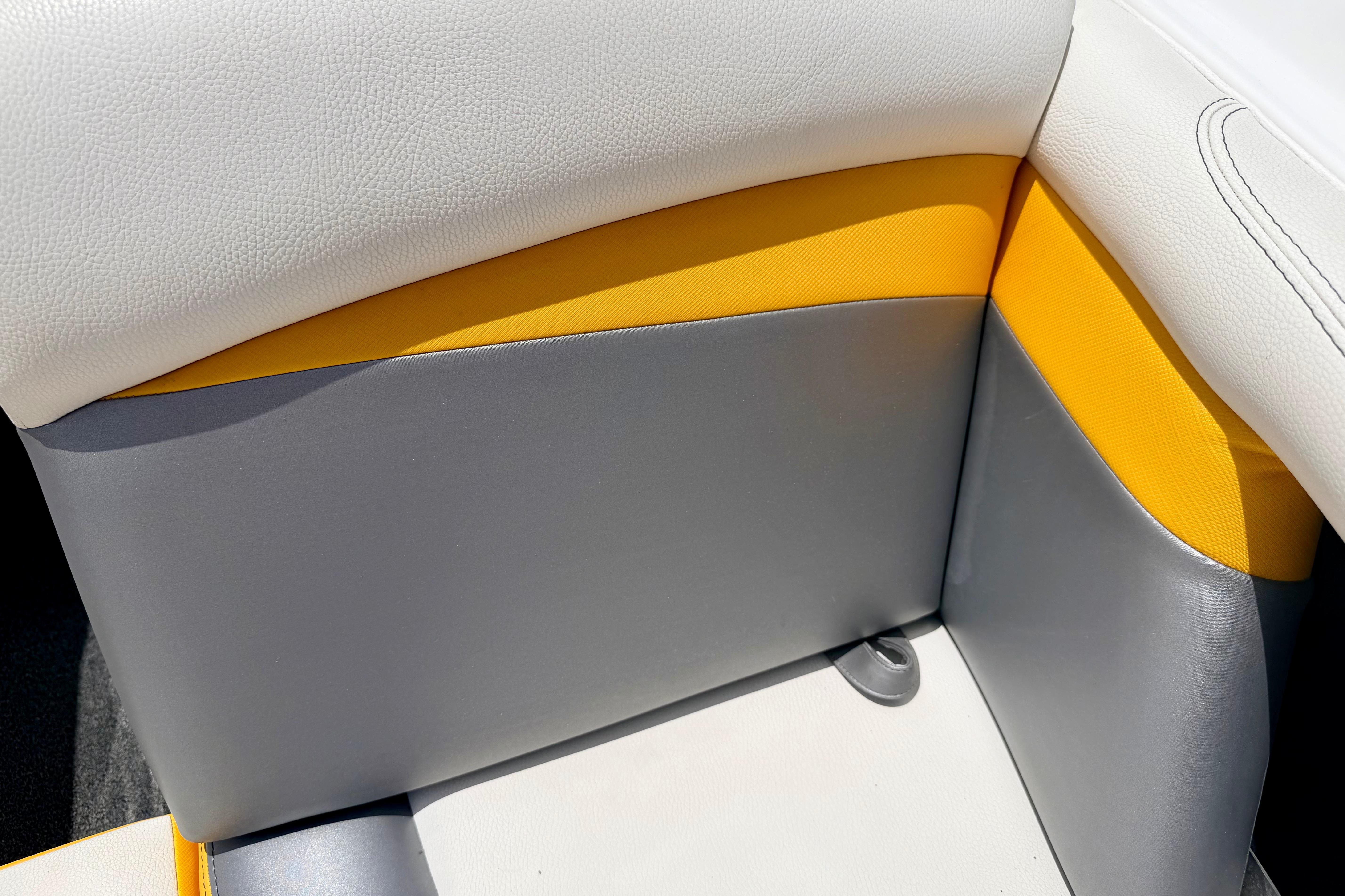 2014 Tigé R20 boat interior with gray, white, and yellow upholstery.