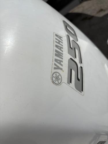 Yamaha 250 outboard motor on 2014 Hurricane SunDeck Sport 232 OB boat.