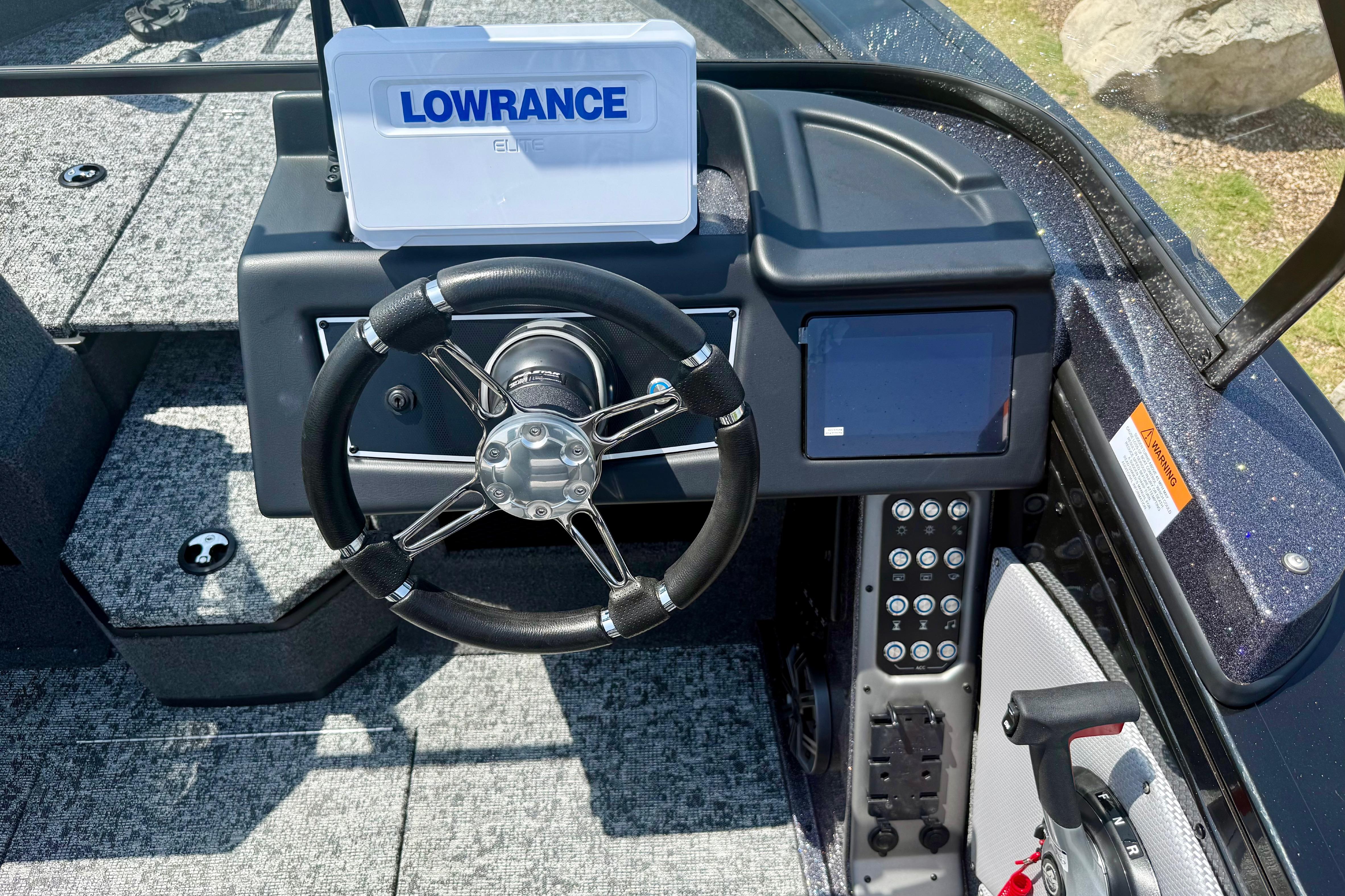2026 Ranger VX1788 WT boat dashboard with Lowrance Elite display and steering wheel.
