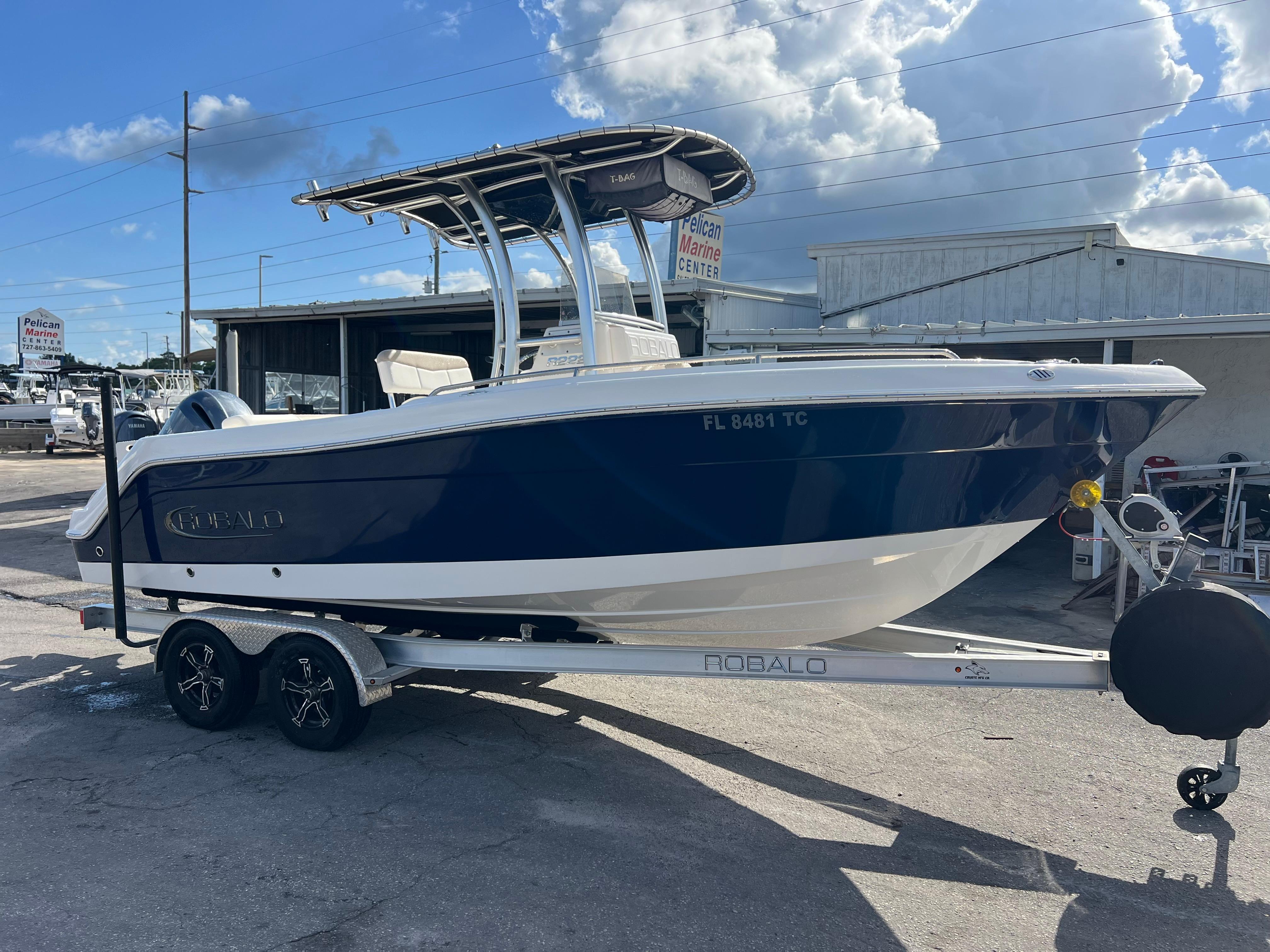2022 Robalo R222 Center Console boat on trailer at marina.