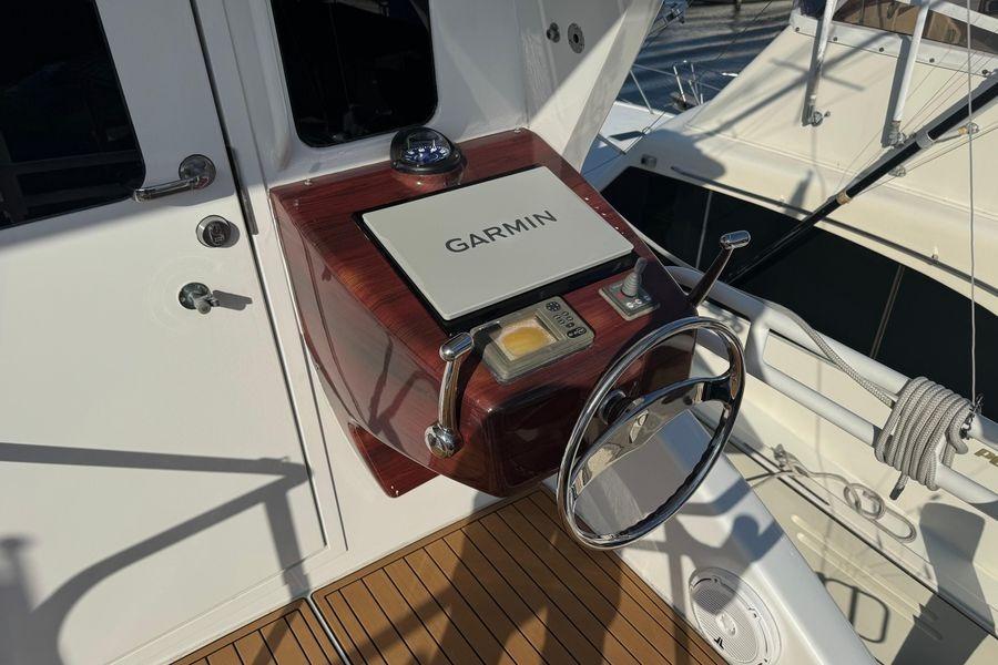 Steering console of 2002 Viking 61 Enclosed Bridge with Garmin navigation system.