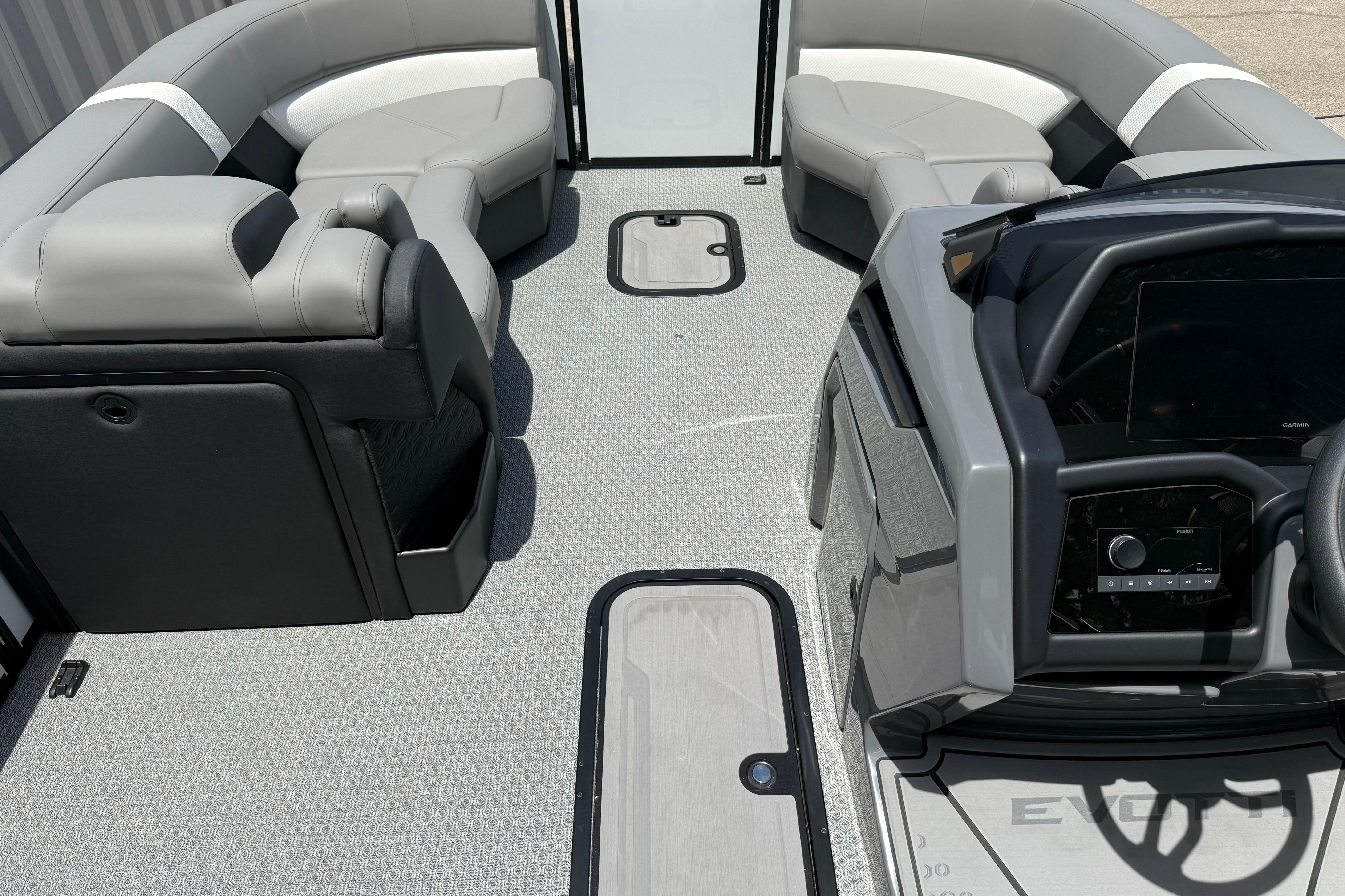 2026 Evotti 723QL boat interior with modern seating and advanced dashboard controls.
