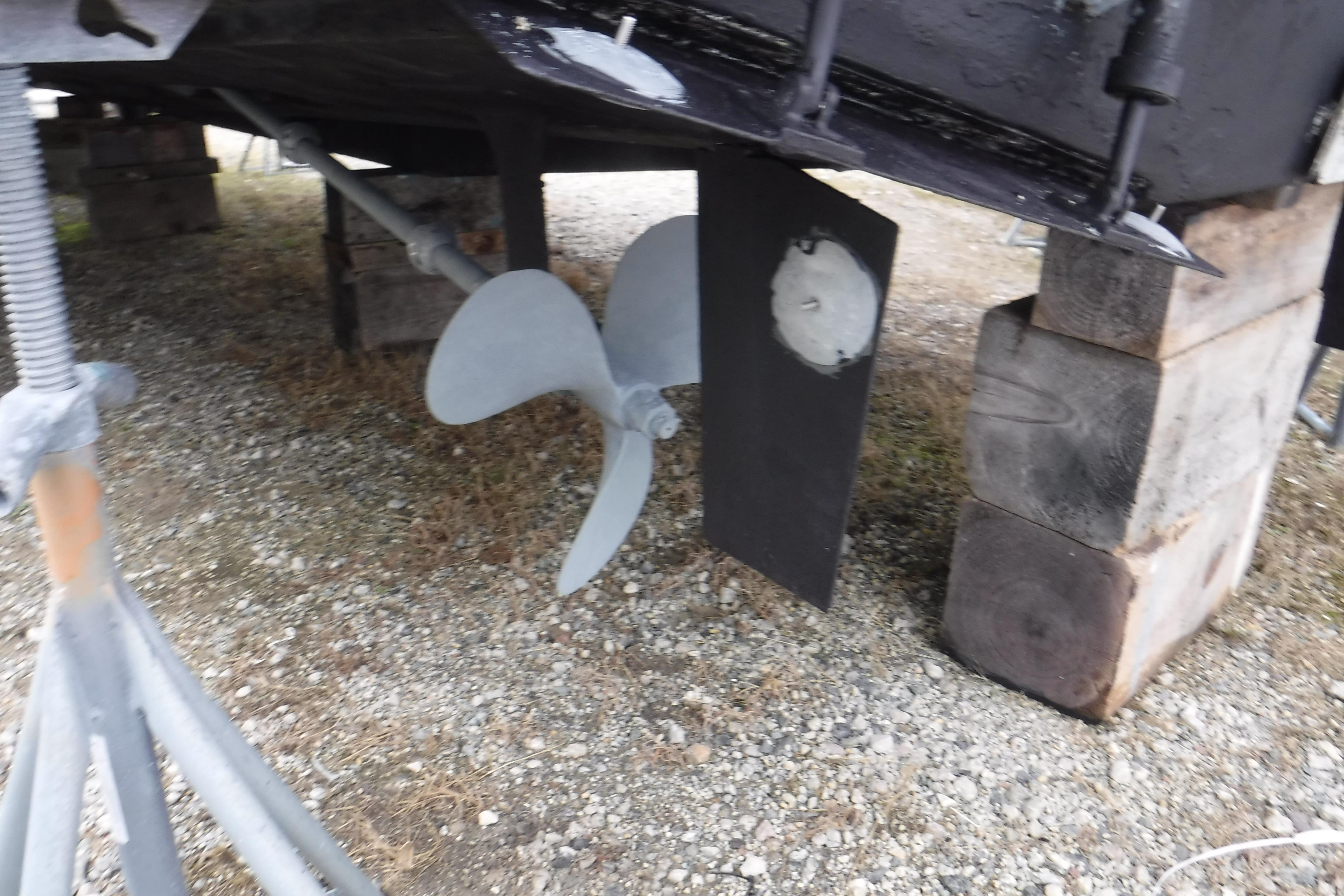 1989 Viking 41 Sportfish Convertible propeller and rudder on dry dock.