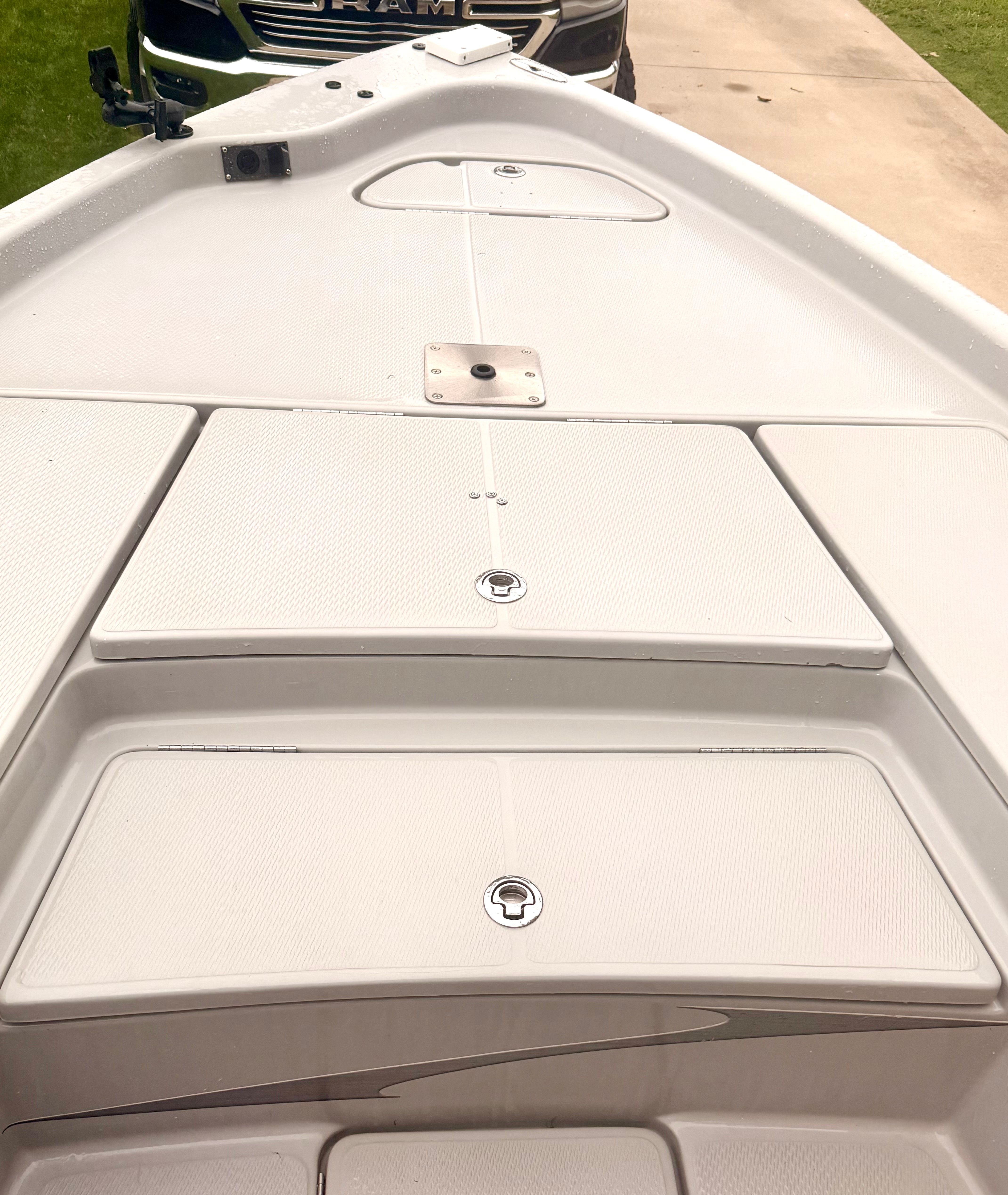 The image shows the bow deck of a 2013 Blue Wave Pure Bay 2200 boat.