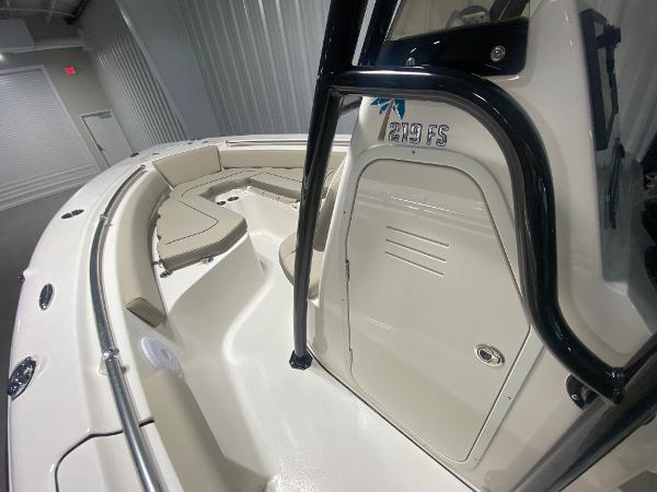 2024 Key West 219 FS boat interior with seating and storage compartments.