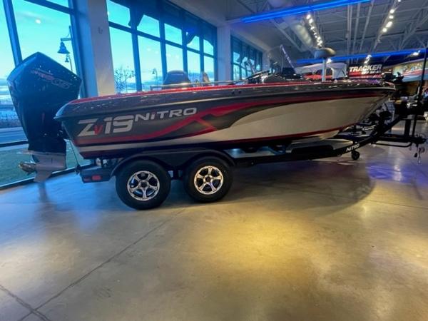 2025 Nitro ZV19 boat displayed in showroom with sleek design and modern features.
