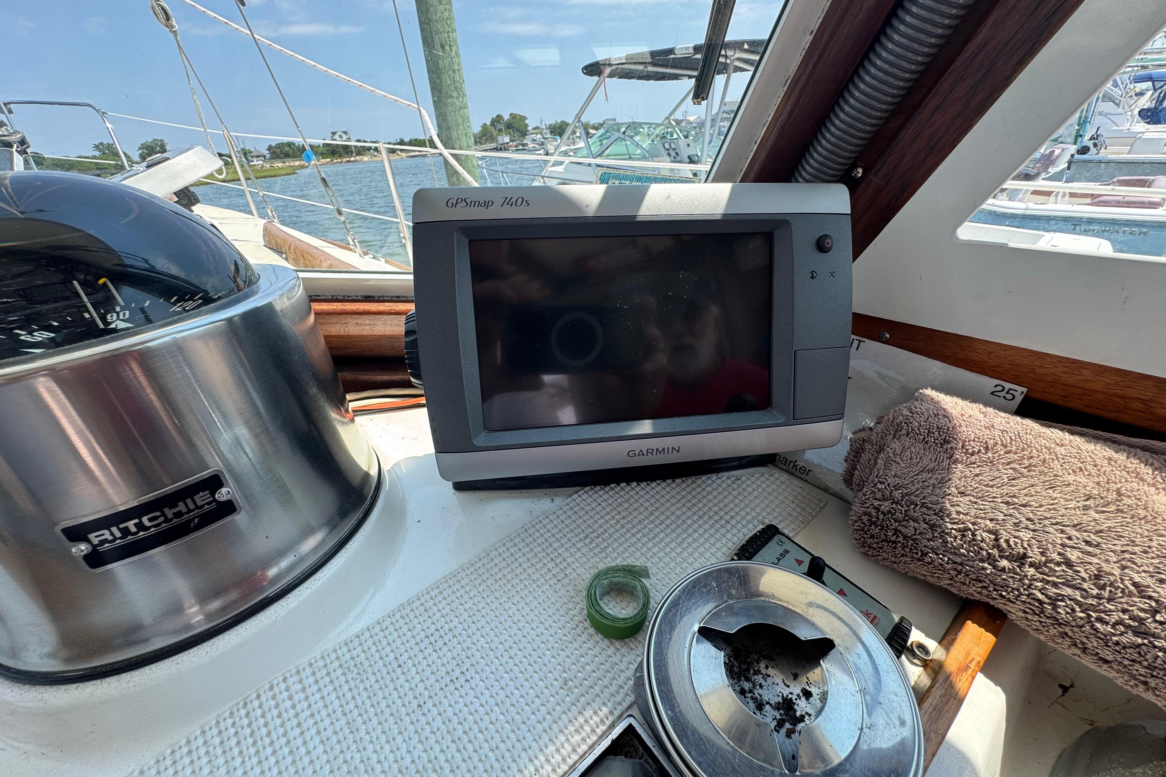 Cockpit of 1989 Cape Dory 30 Motorsailer with Garmin GPSmap 740s and Ritchie compass.