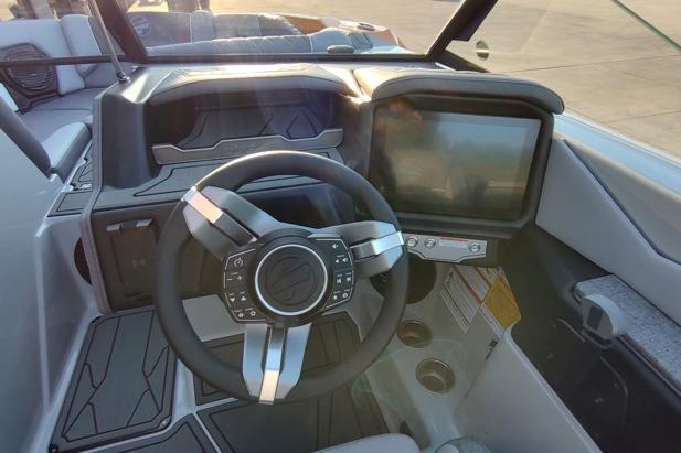 2026 Tigé Z3 boat dashboard with modern steering wheel and touchscreen display.