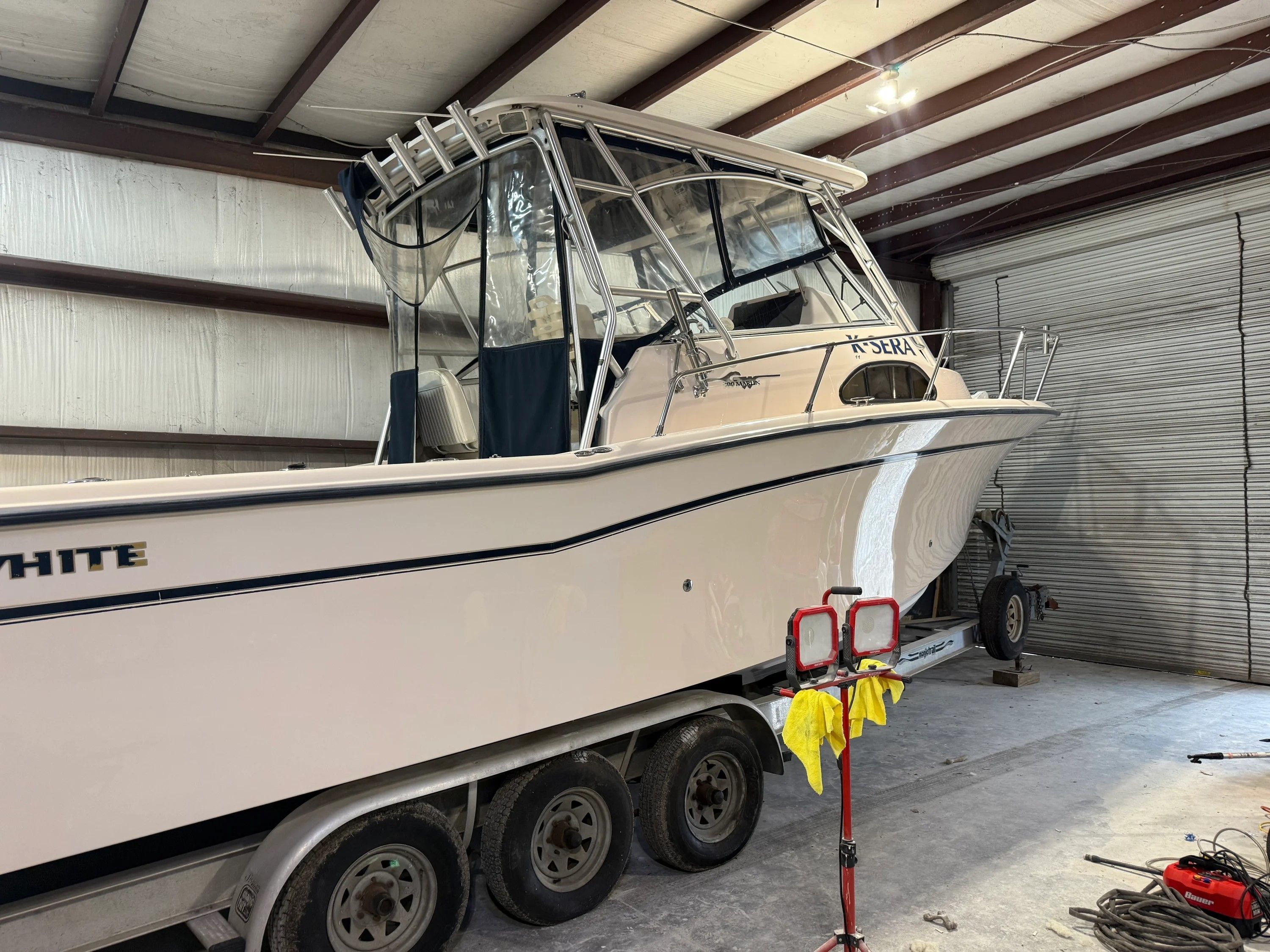 2002 Grady-White Marlin 300 boat in storage facility.