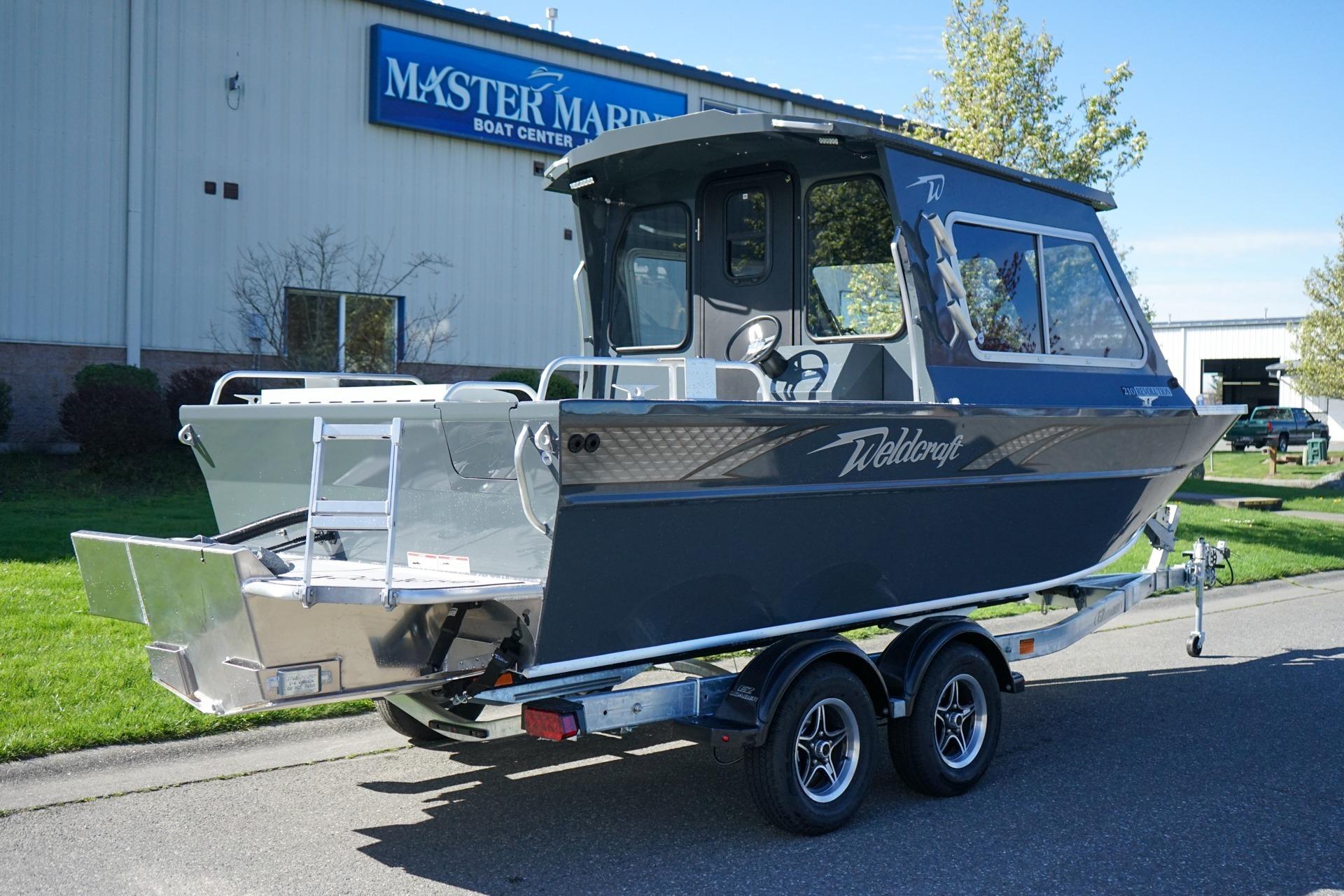 2026 Weldcraft 210 Revolution boat on trailer at Master Marine Boat Center.