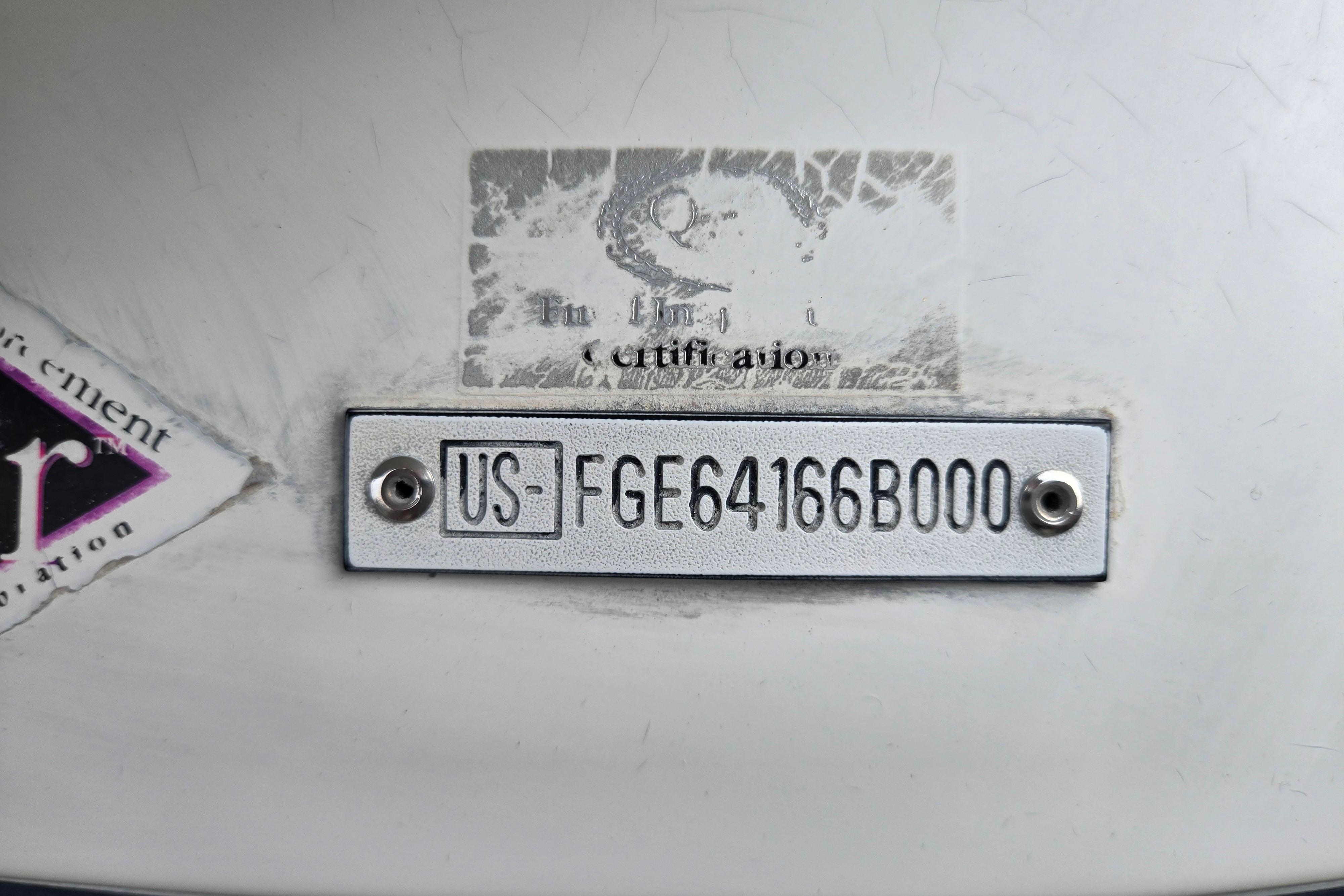 VIN plate on a 2000 Cobalt 246 boat, displaying identification number.