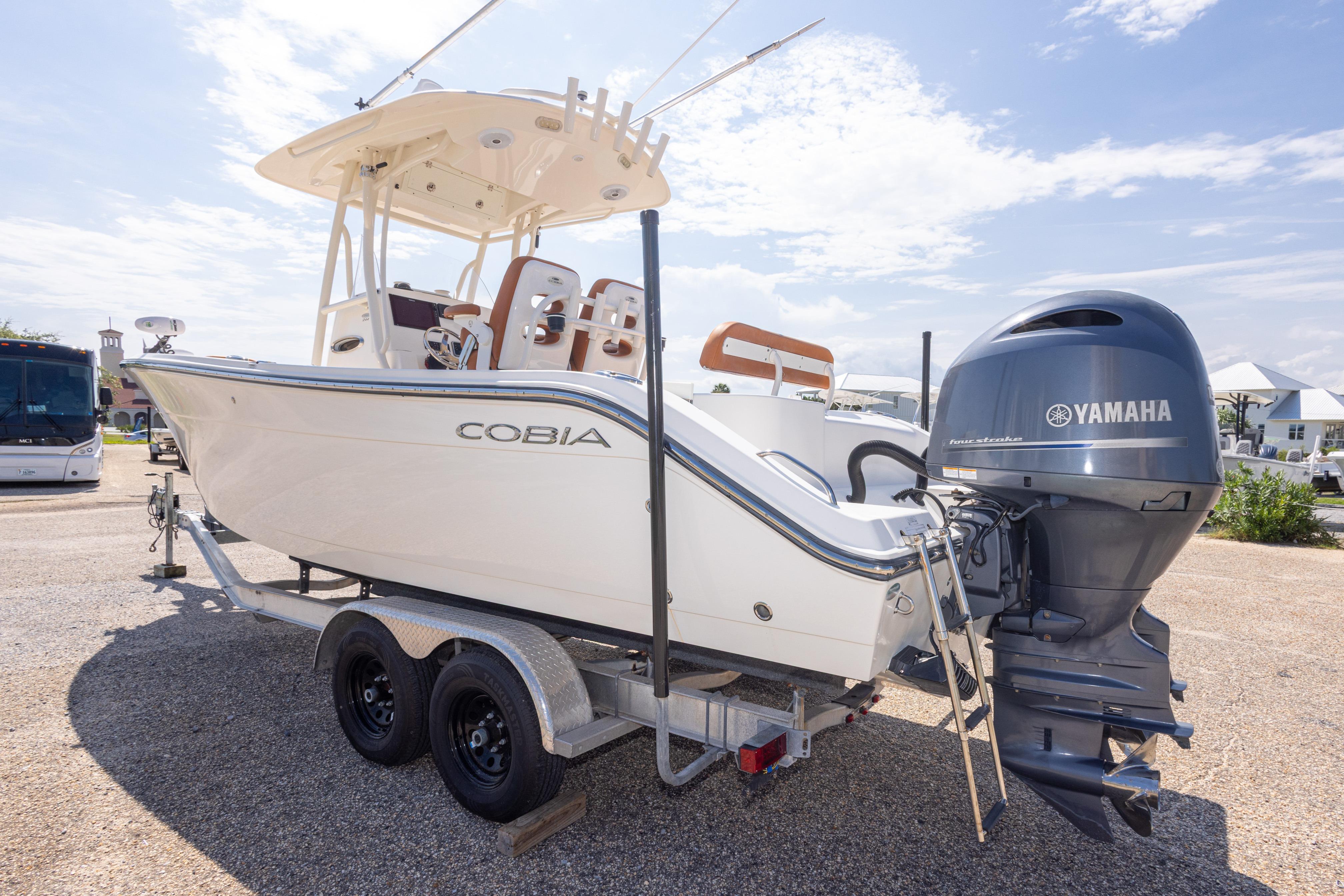 2017 Cobia 261 Center Console boat on trailer with Yamaha outboard motor.