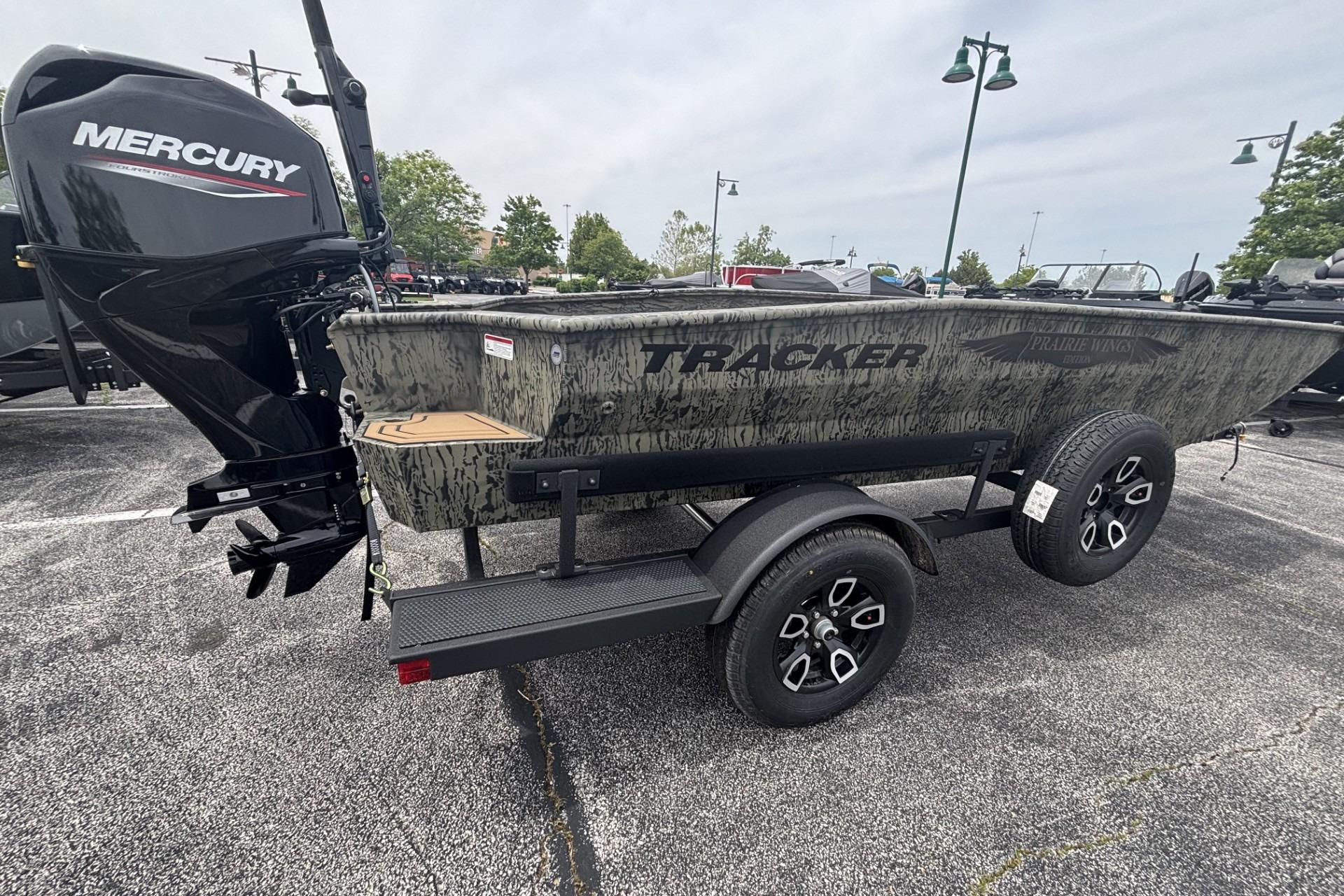 2026 Tracker Grizzly 1650 T Prairie Wings Edition boat on trailer, featuring Mercury engine.