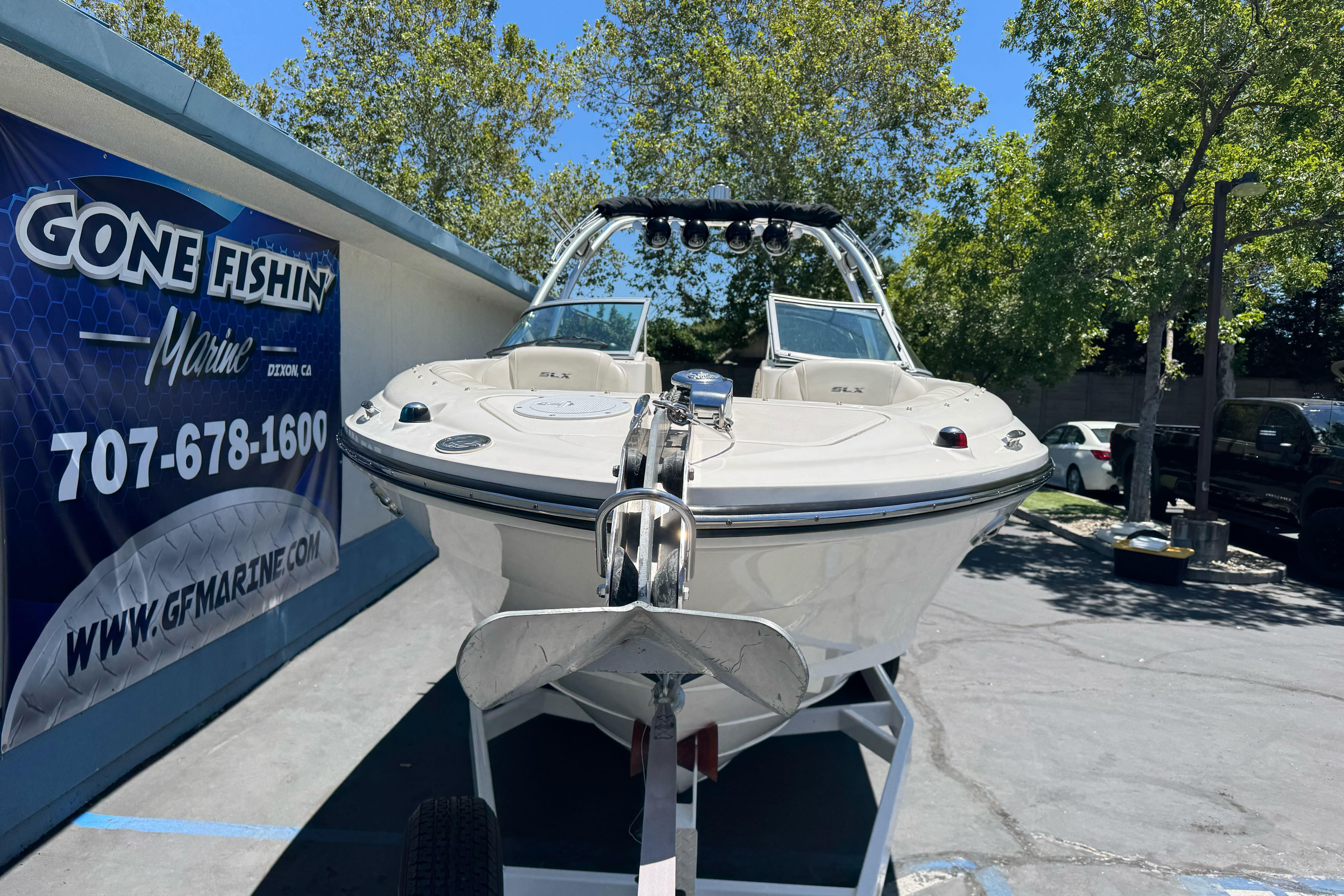 2007 Sea Ray SLX 250 boat displayed at Gone Fishin' Marine dealership.