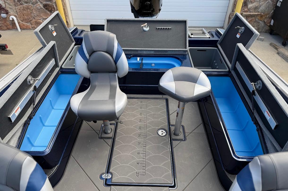 Interior of 2026 Nitro ZV21 Pro boat with seating and storage compartments.