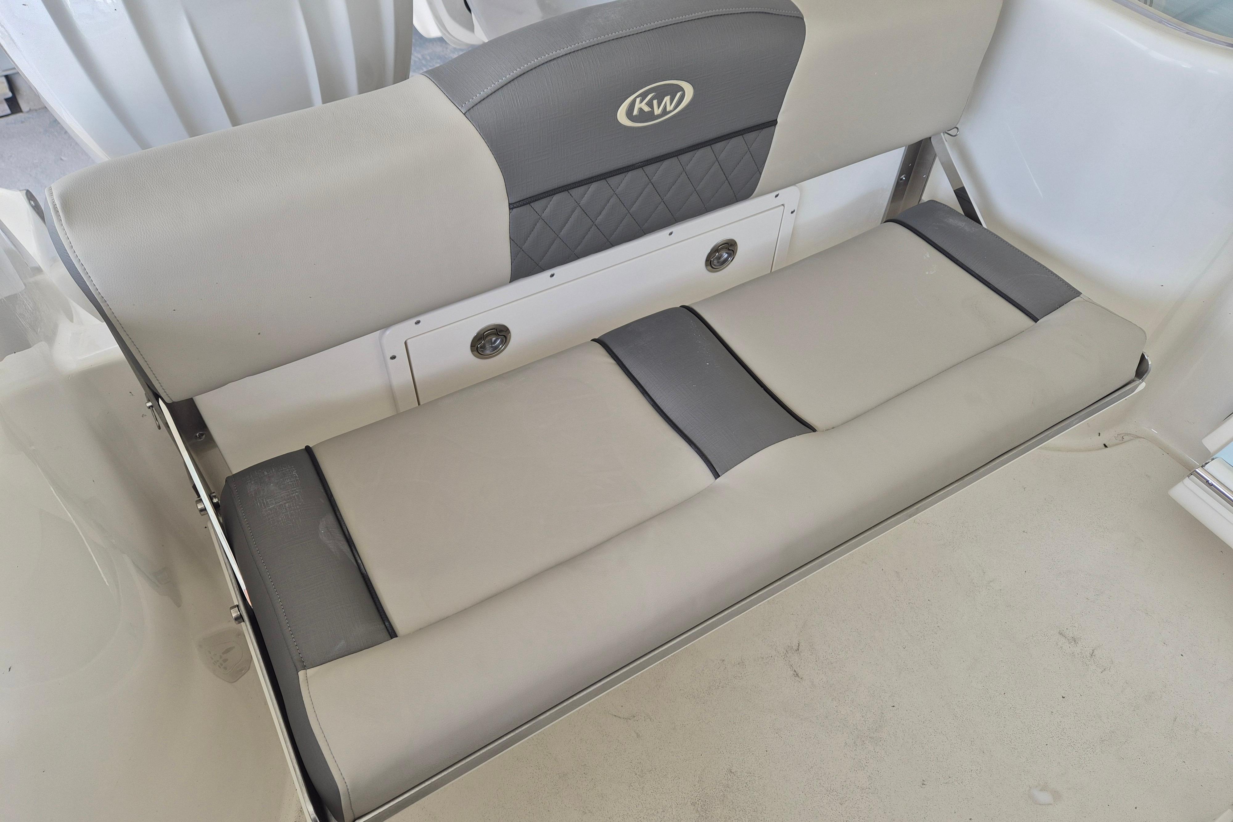 2026 Key West 260 Center Console boat seat, featuring gray and beige cushioned design.
