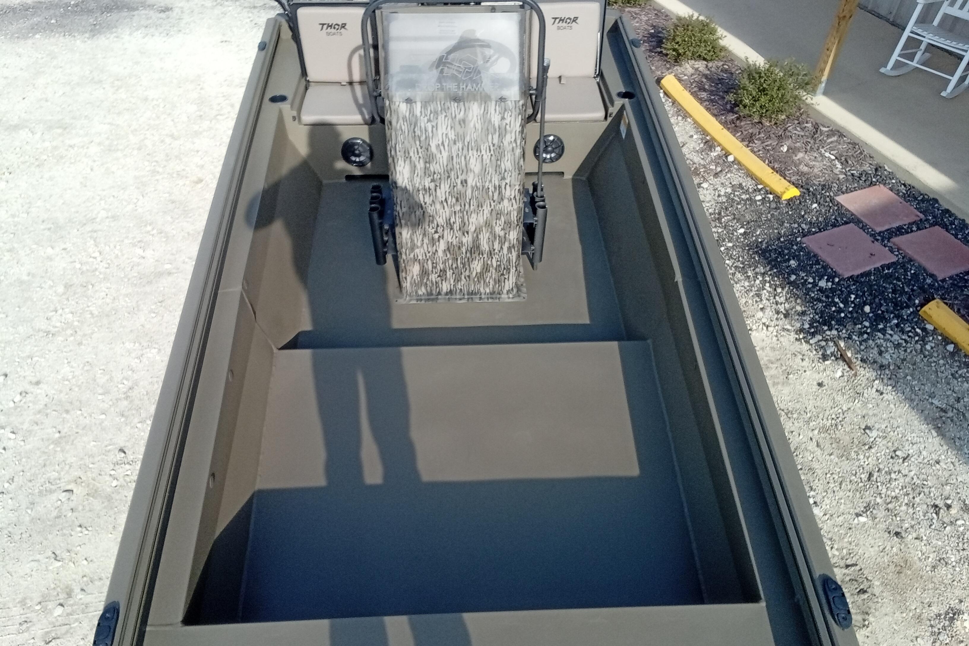 2026 Thor 1900 Low Country Elite boat interior, featuring spacious seating and modern design.