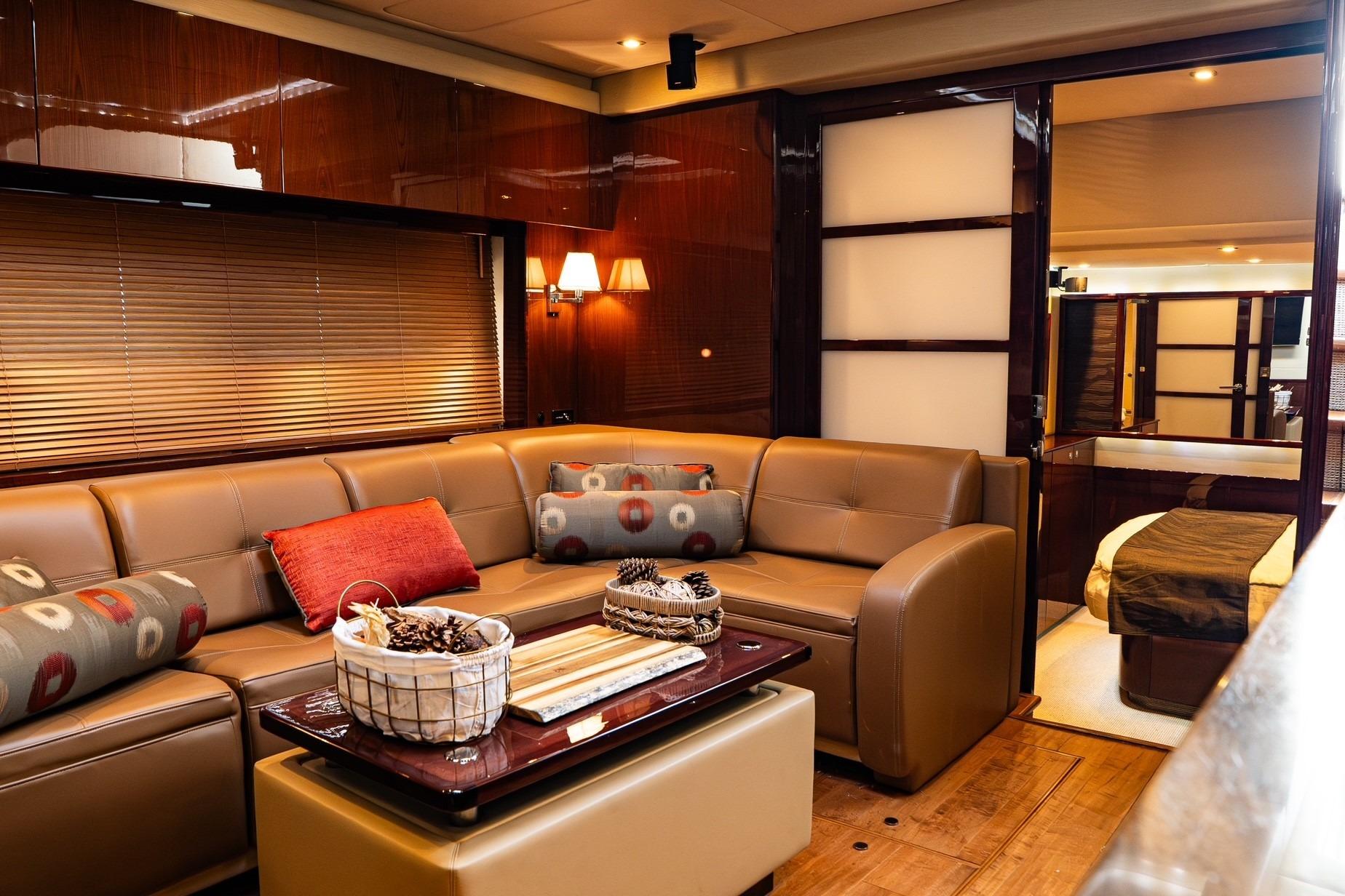 Luxurious interior of 2015 Sea Ray Sundancer 540 yacht with elegant seating and decor.