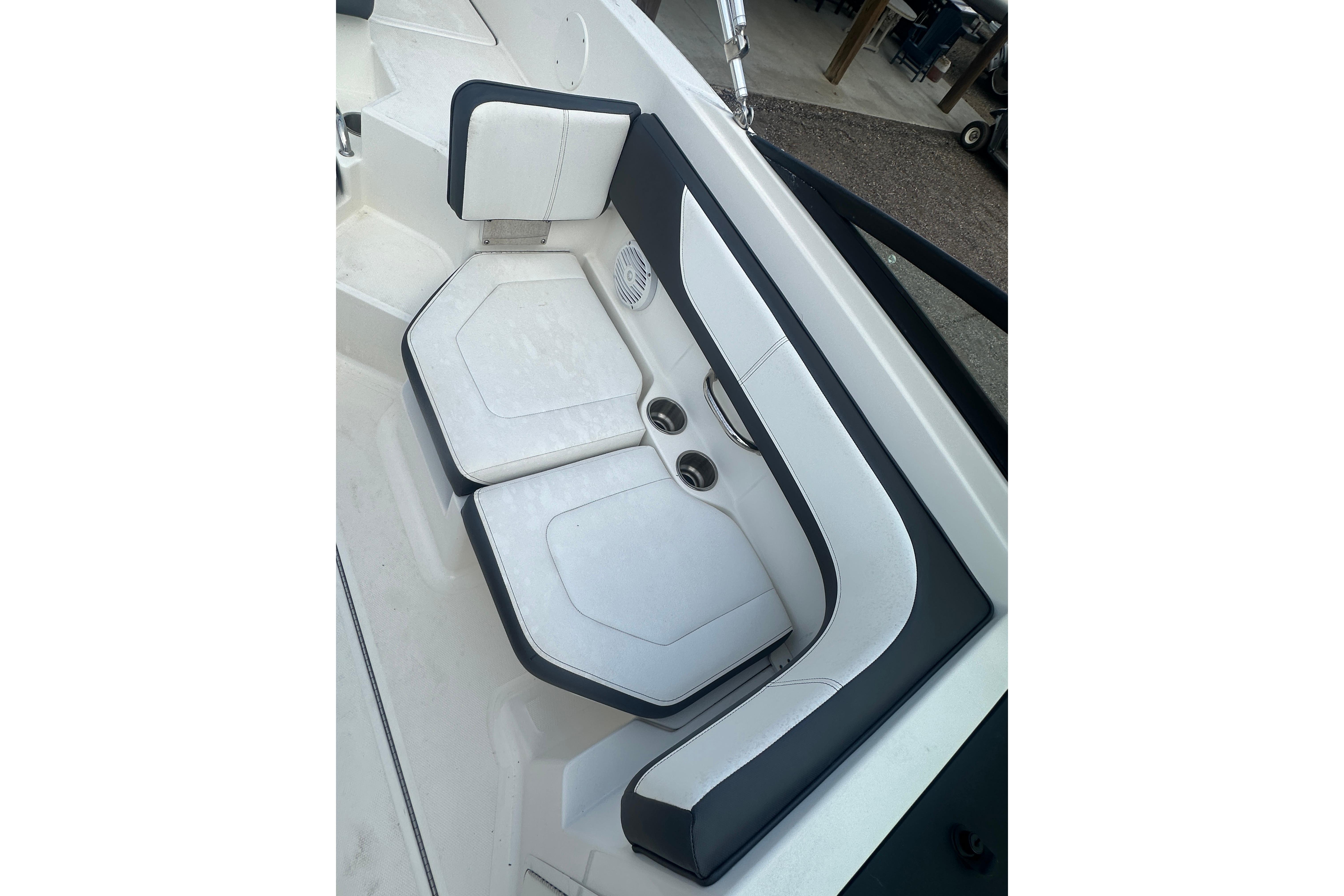 2017 Sea Ray SPX 190 Outboard boat seating with white and black upholstery.