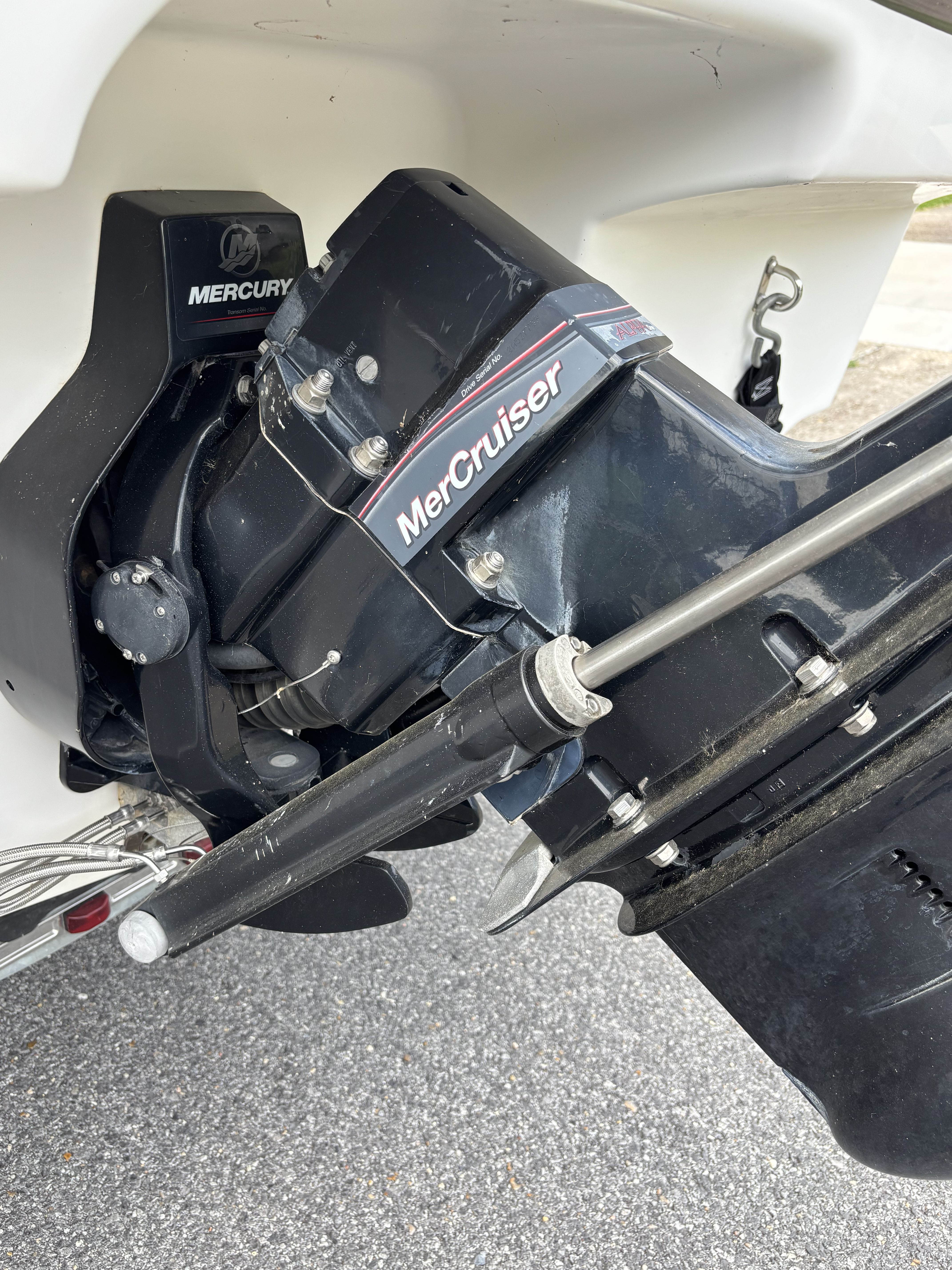 Close-up of a MerCruiser engine on a boat.