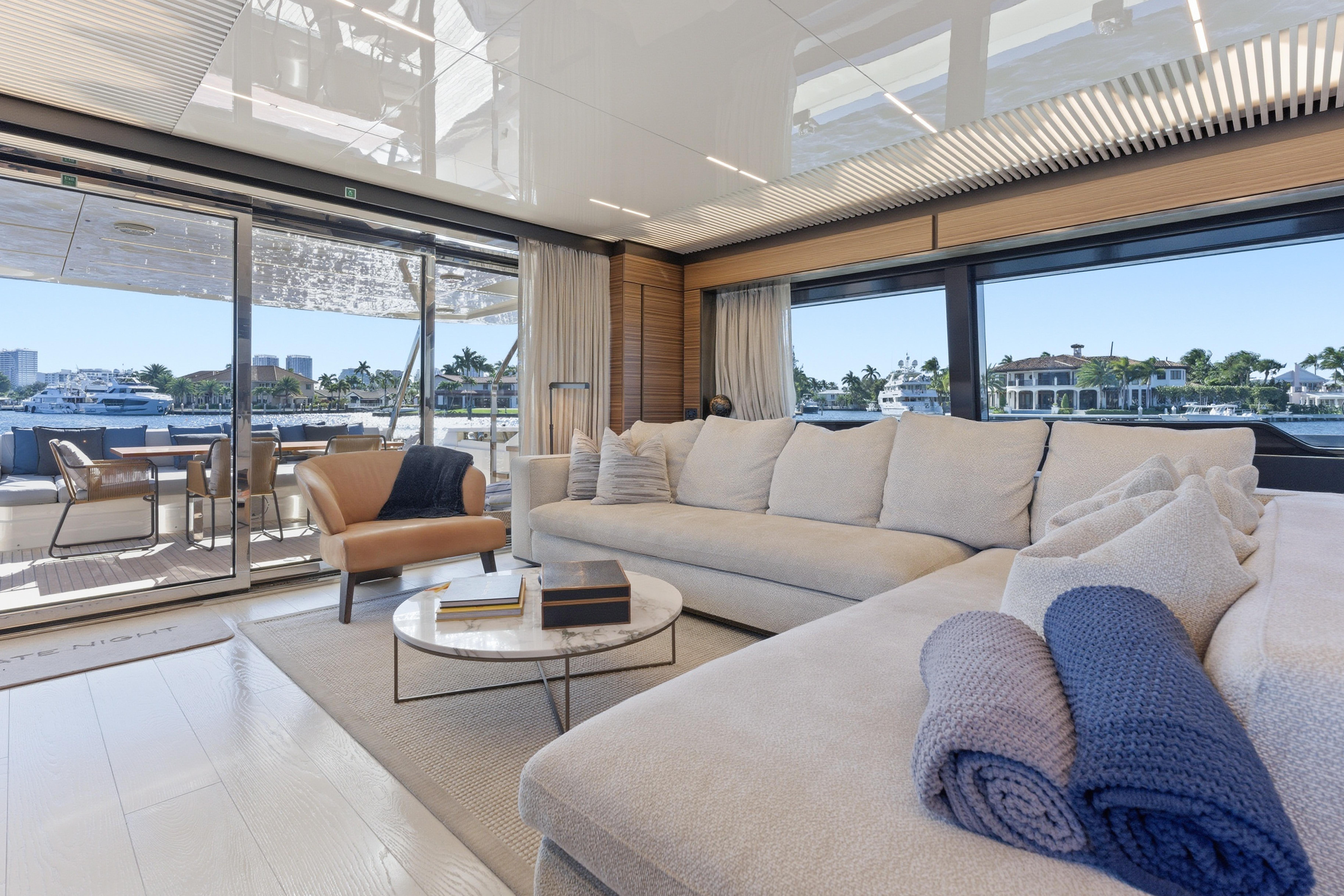 Luxurious interior of 2018 Ferretti Yachts 920 with elegant seating and scenic views.