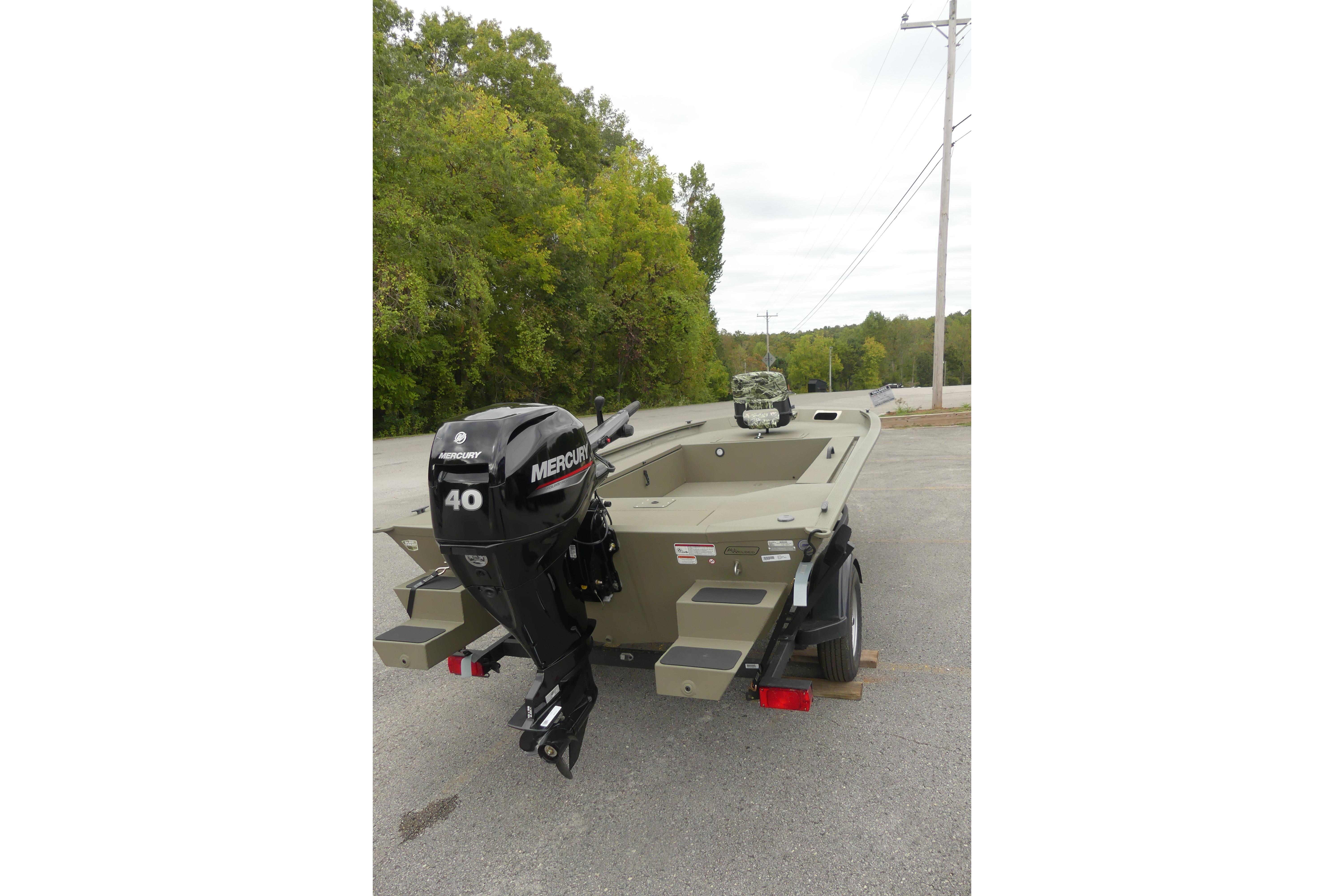 2025 Tracker Grizzly 1654 T Sportsman boat with Mercury 40 outboard motor.