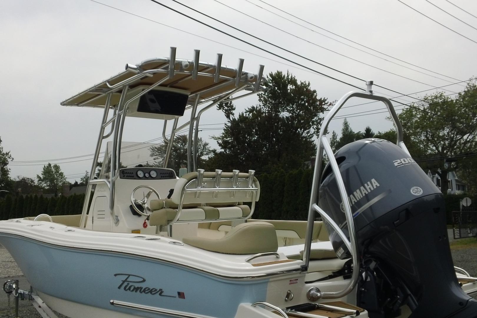 2026 Pioneer 202 Islander boat with Yamaha 200 engine, featuring sleek design and modern amenities.
