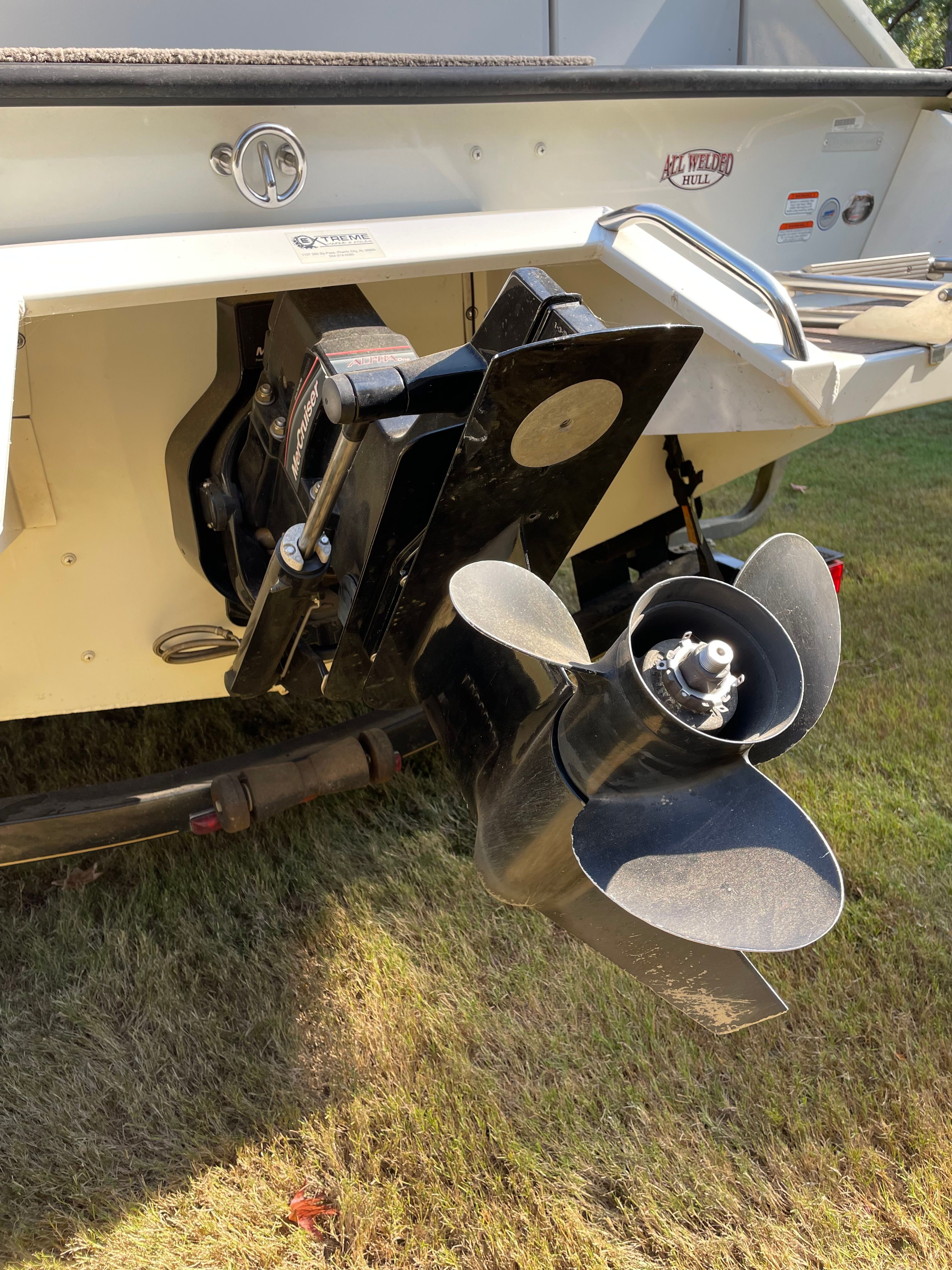 Rear view of a 2005 Sun Tracker Party Deck 21 I/O boat.