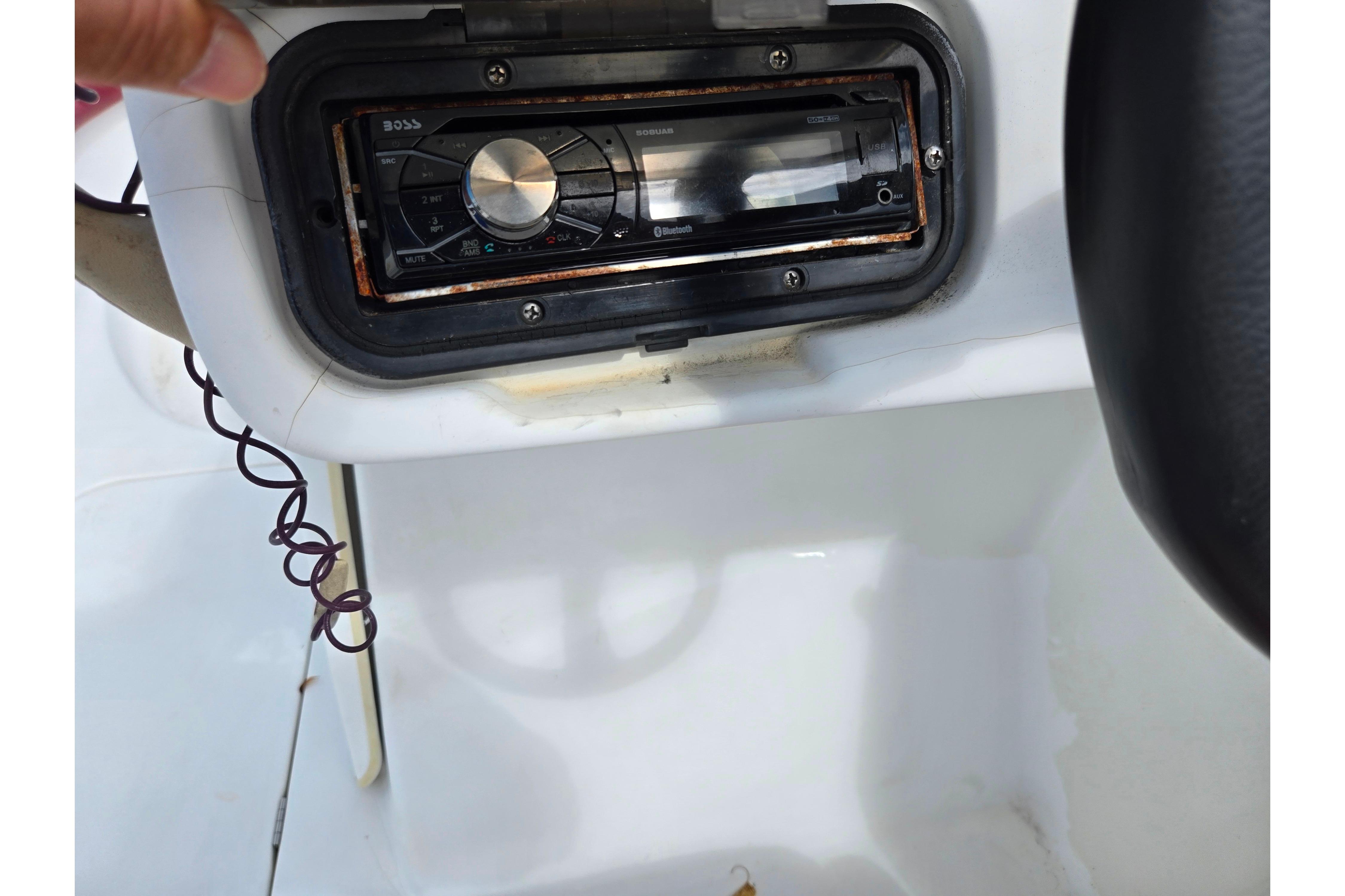2004 Sea-Doo Islandia boat dashboard with a Boss audio system.