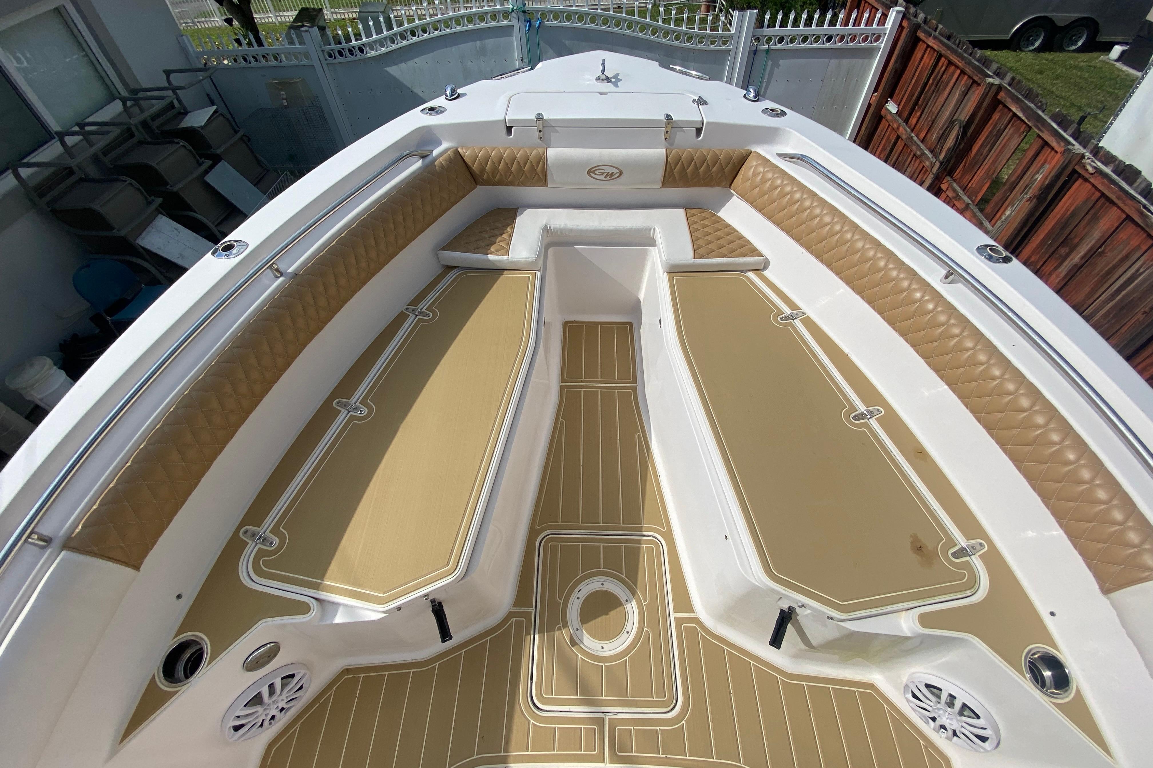 2004 Grady-White Canyon 283 boat interior with tan seating and deck.
