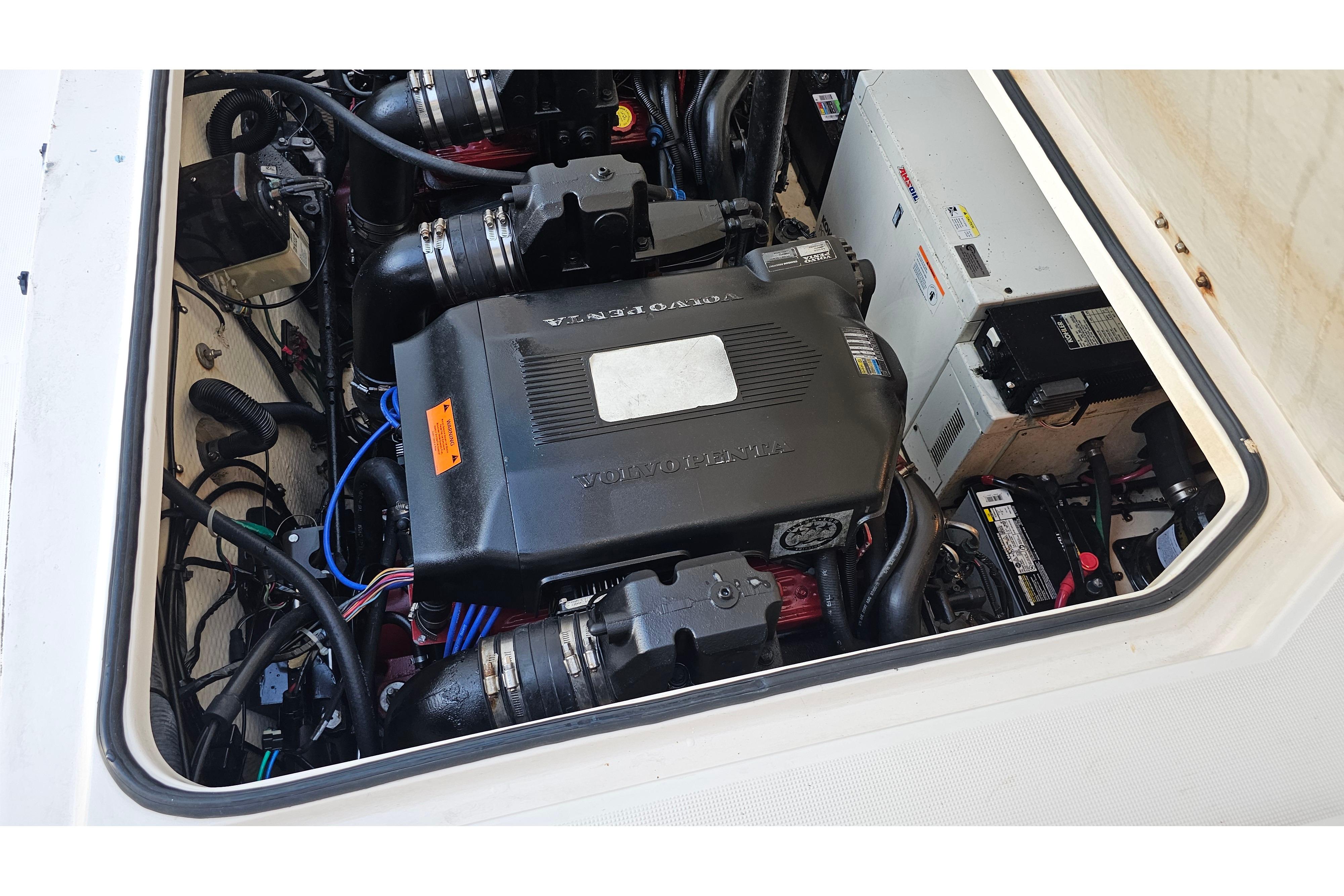Engine compartment of a 2005 Regal 3060 Window Express boat, featuring Volvo Penta components.