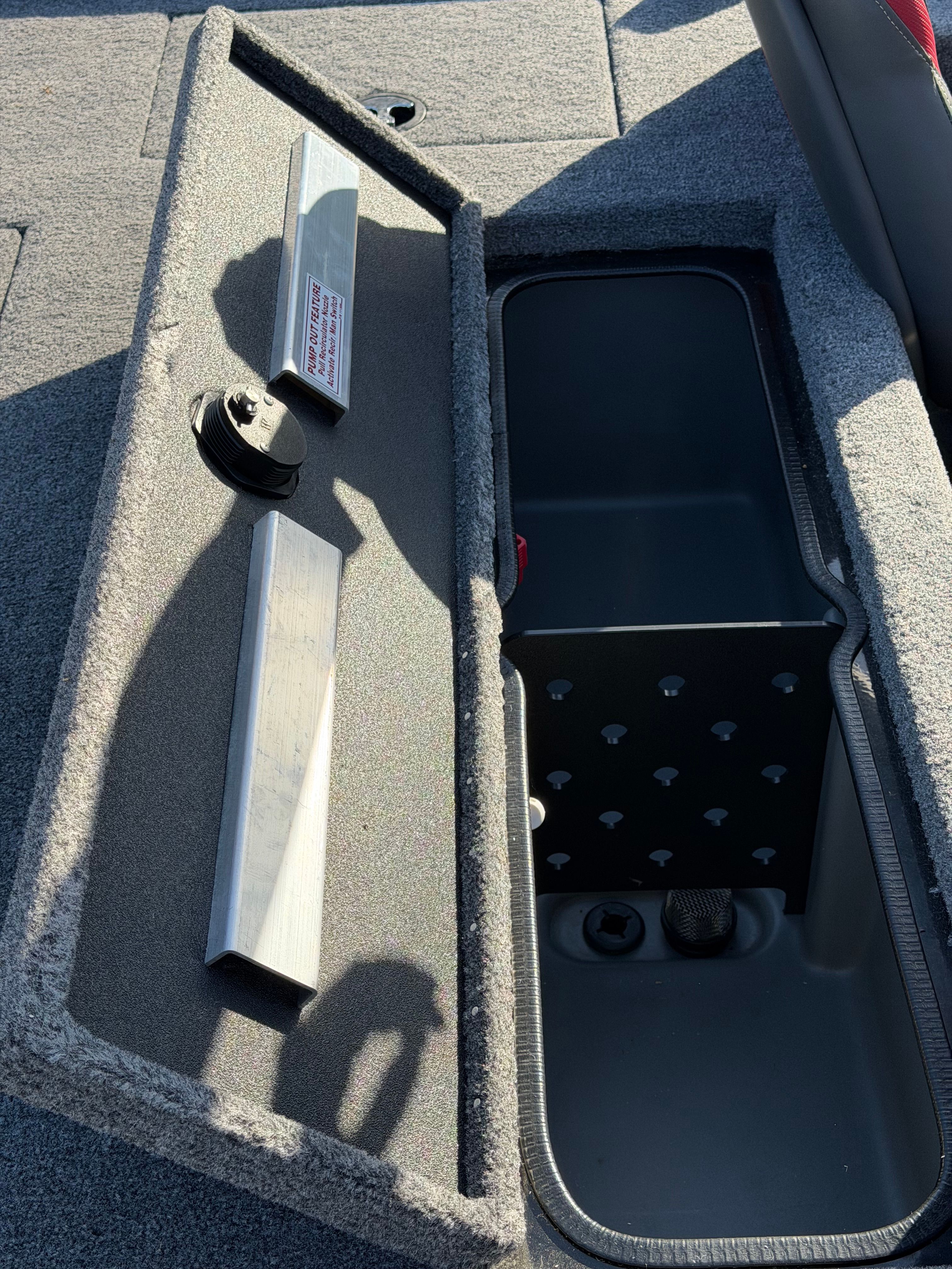2024 Ranger RT188 boat storage compartment with open lid.