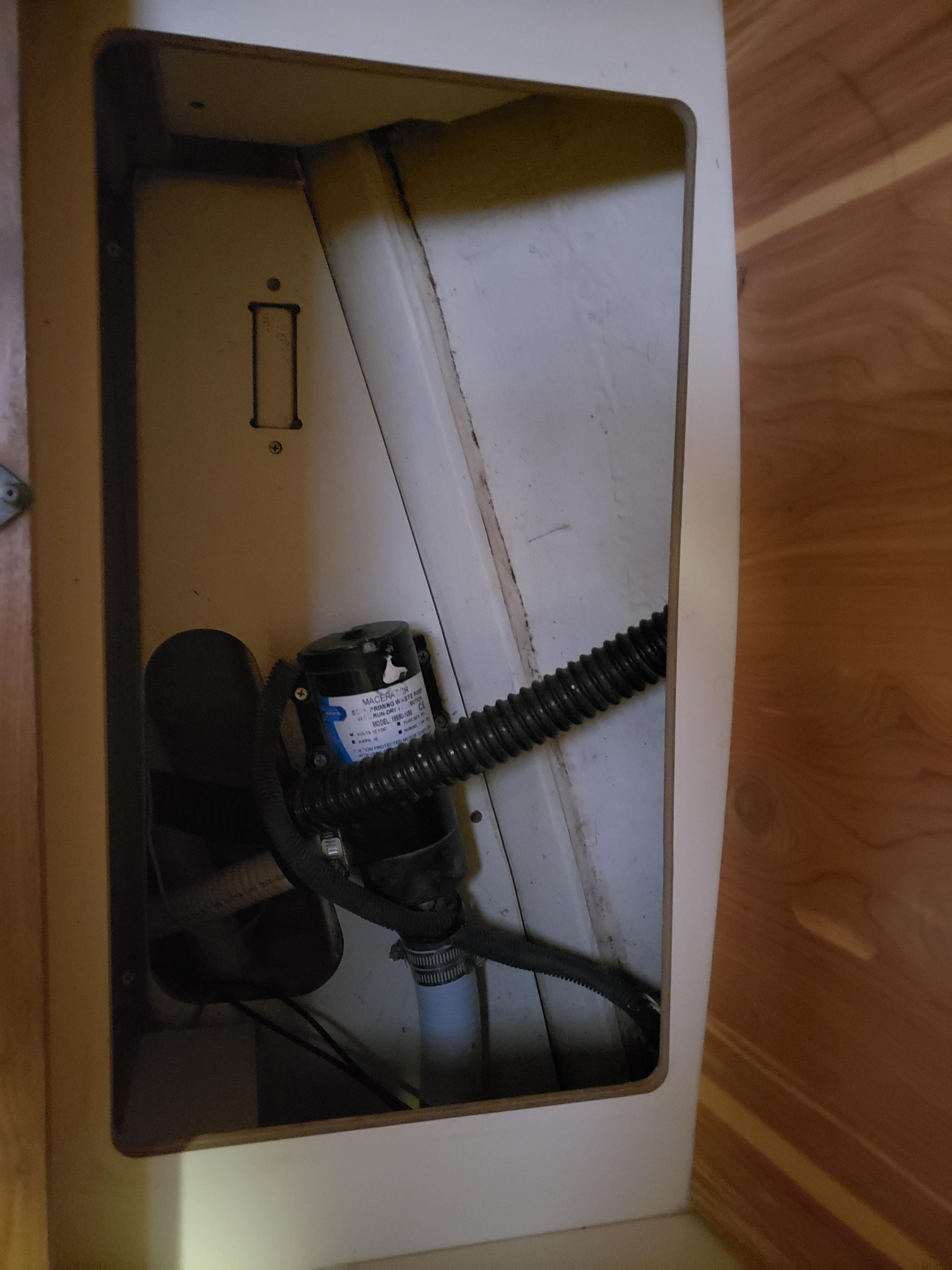 Bilge pump inside a 2006 Hunter 41 sailboat compartment.