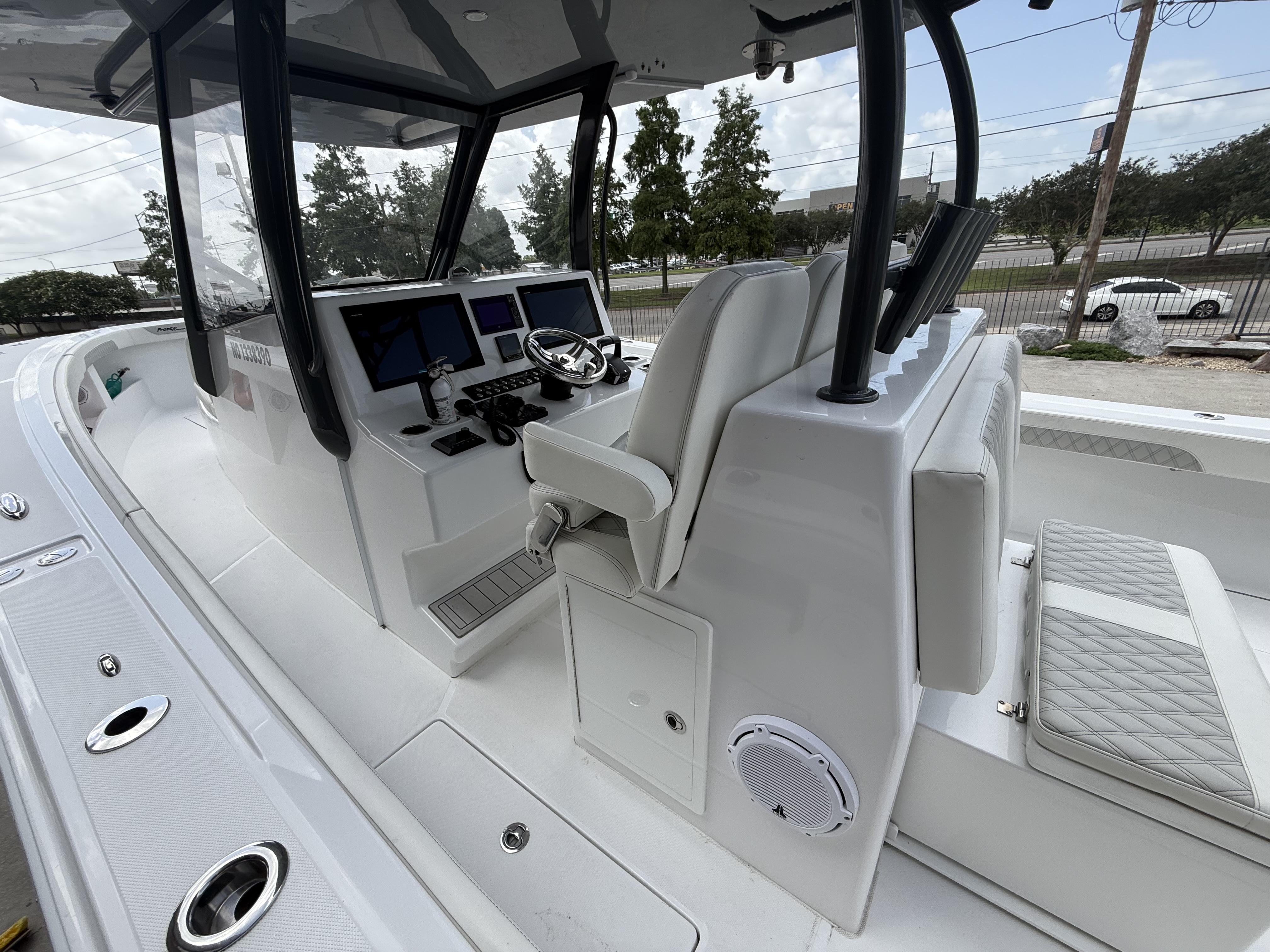 2024 Front Runner 39 CC boat interior with modern helm and seating.