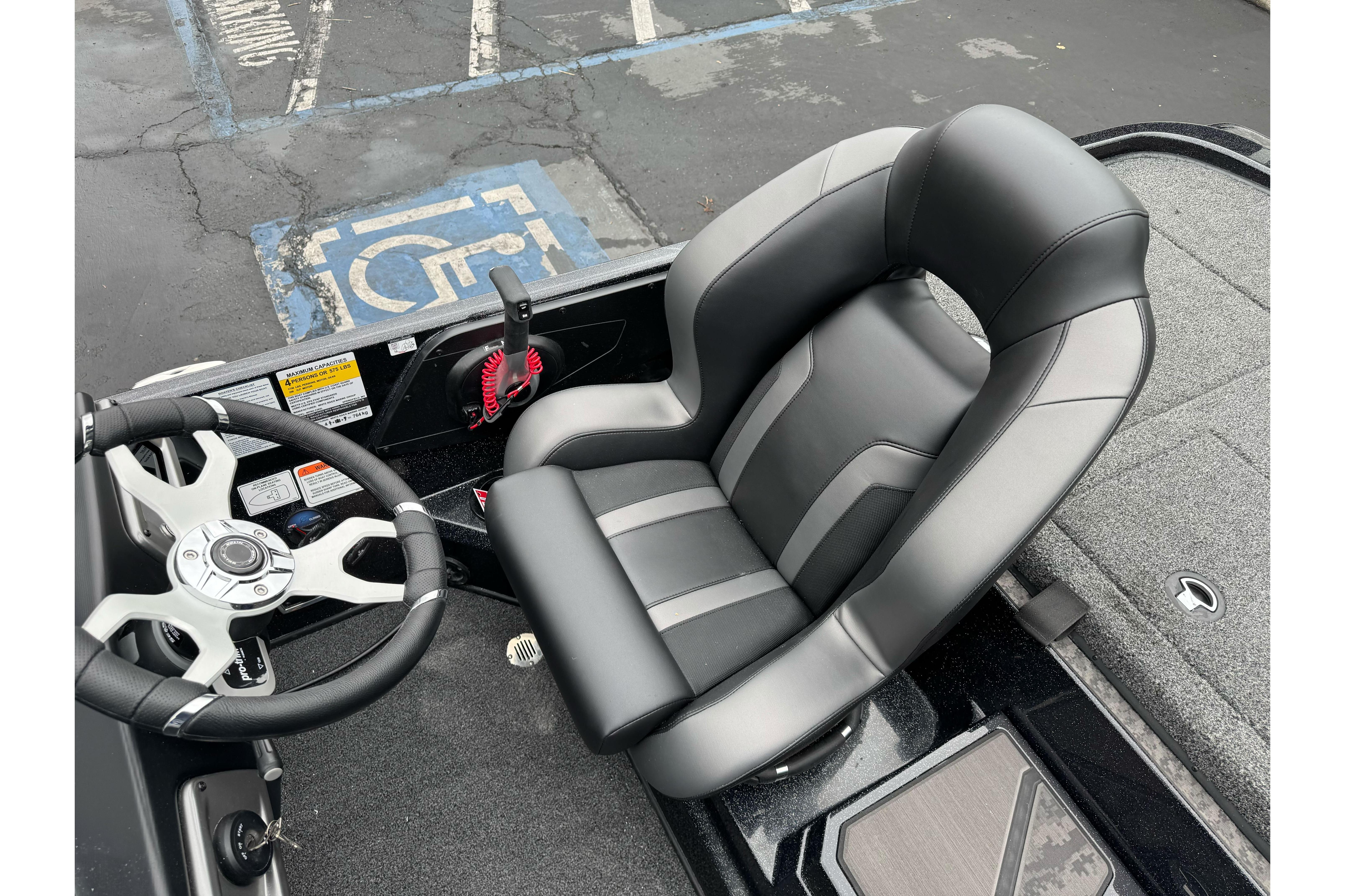 Captain's seat and steering wheel of 2026 Nitro Z20 XL Pro boat.