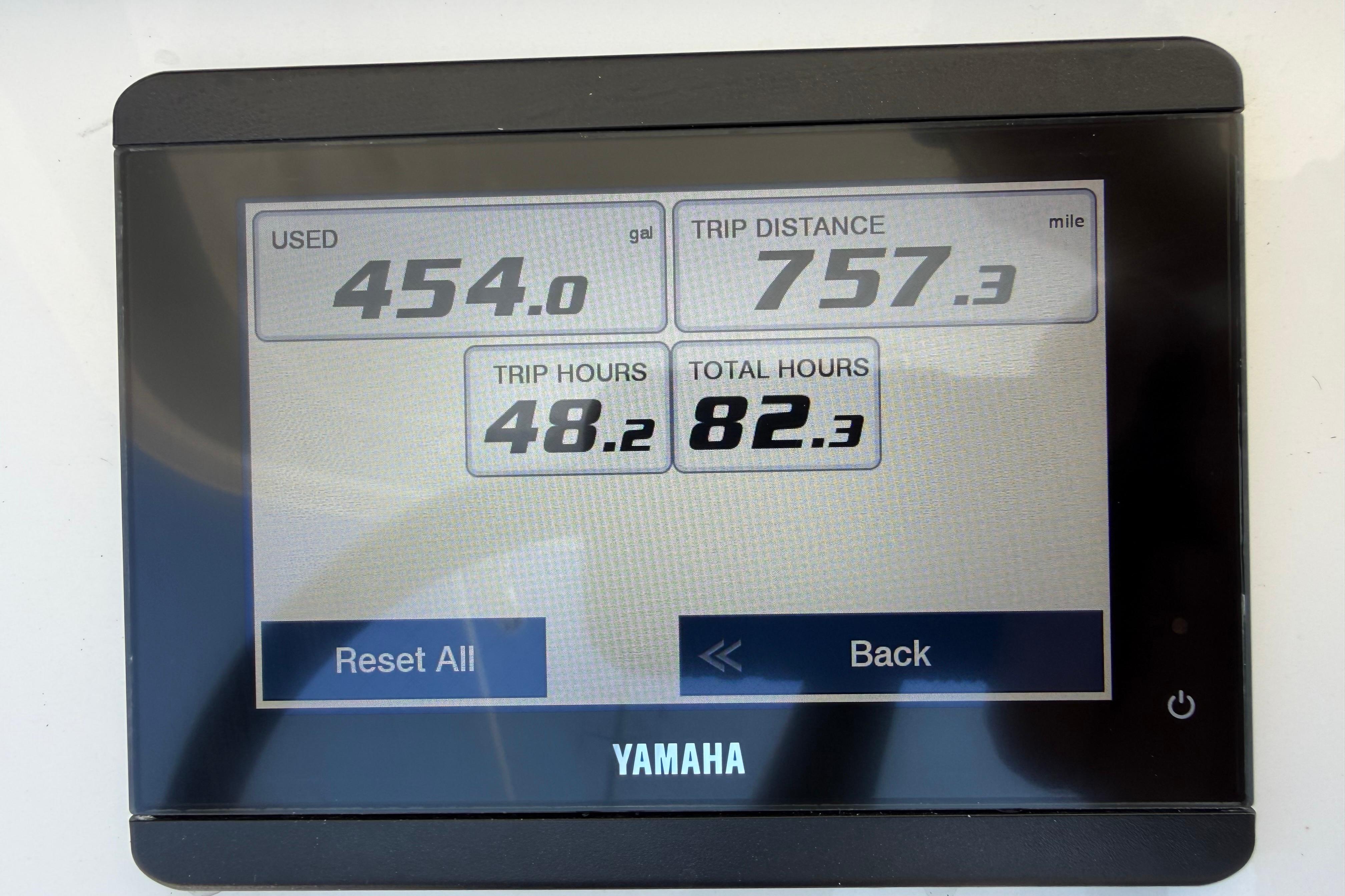Yamaha display showing fuel usage, trip distance, and hours for 2023 Regulator 26XO boat.