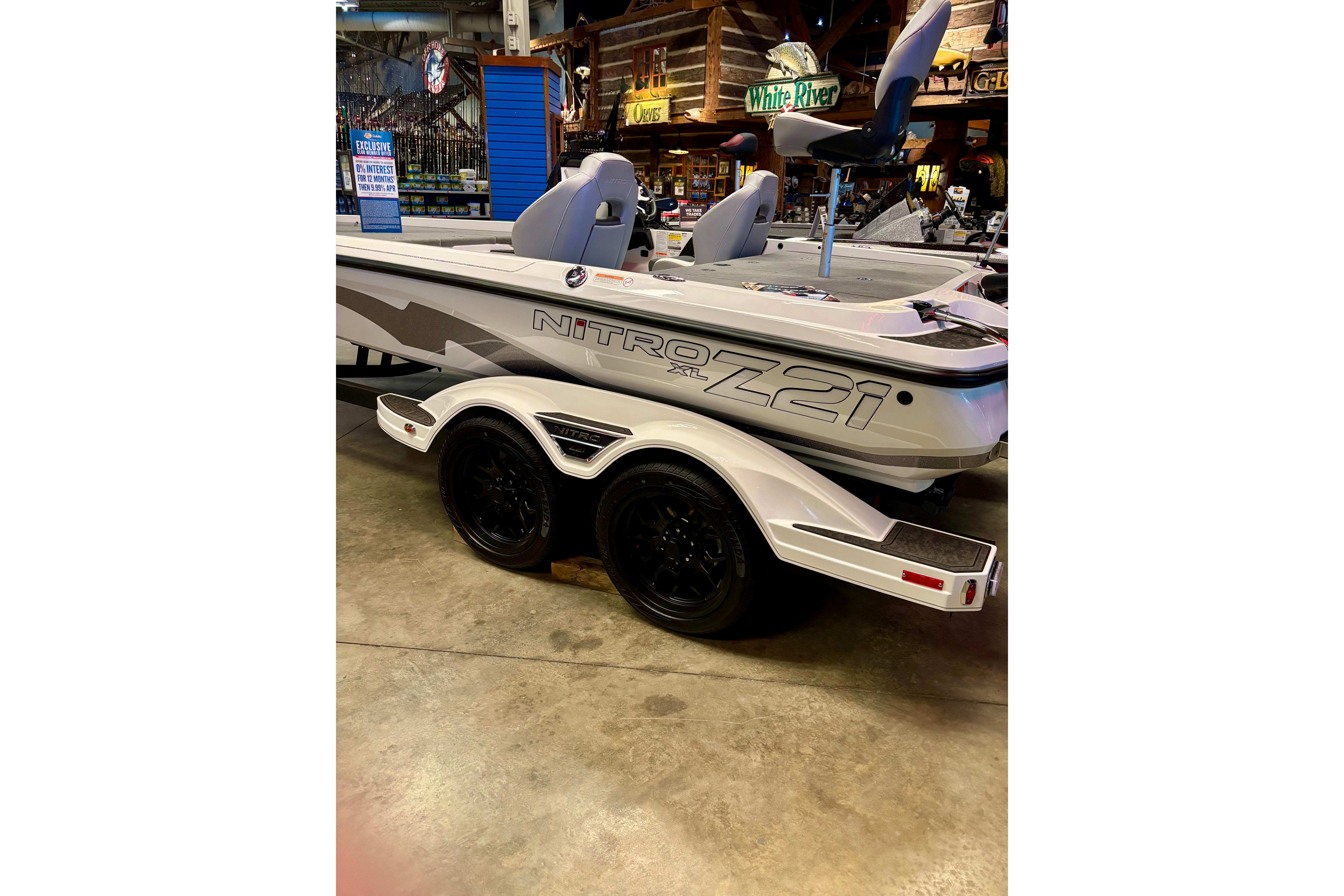 2026 Nitro Z21 XL Pro boat on display in showroom with sleek design.