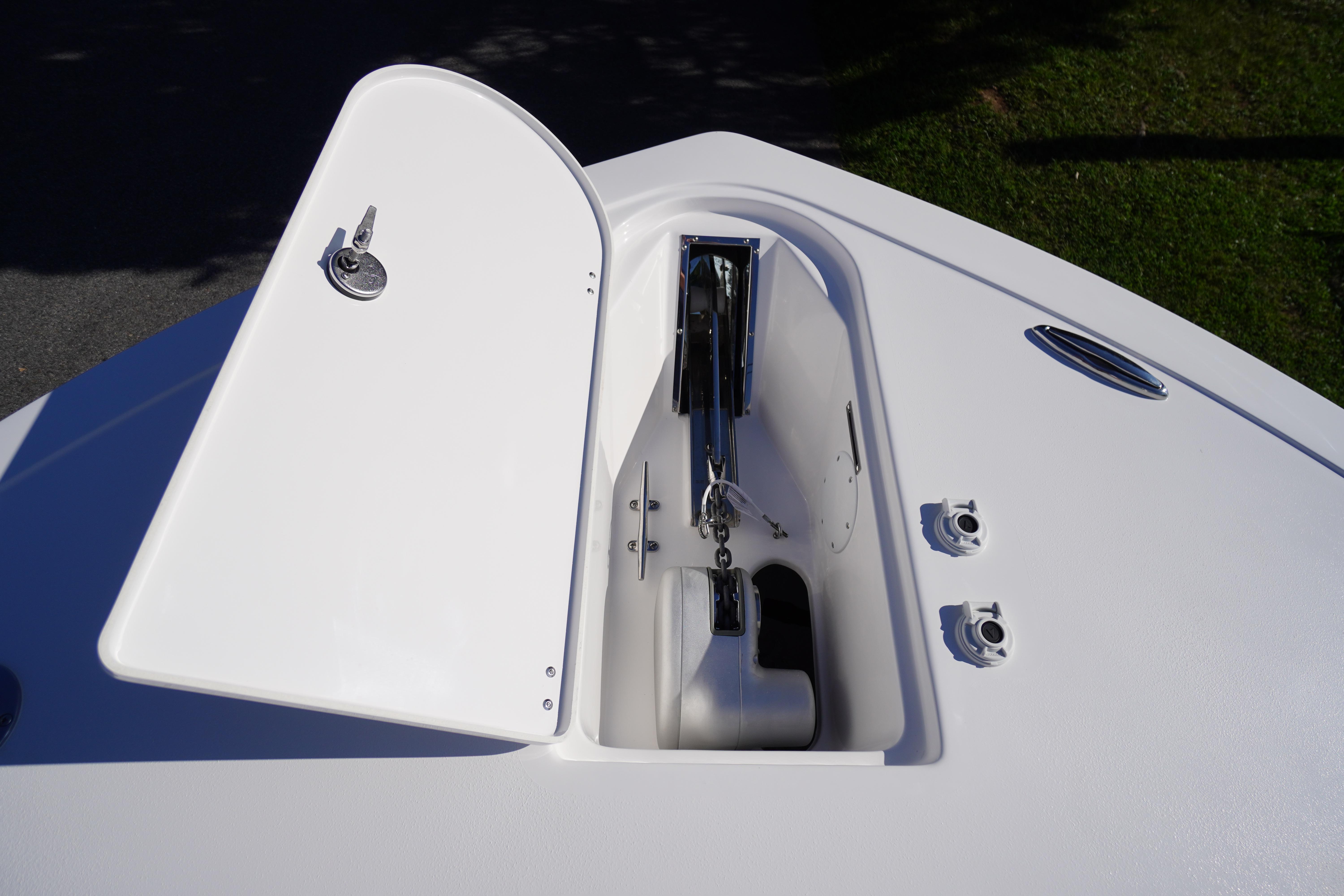 2026 Tidewater 272 LXF boat anchor compartment with open hatch.