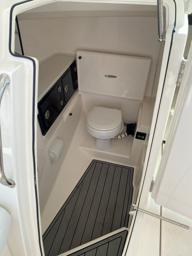 Interior view of Cobia 330 boat toilet, 2023 model.