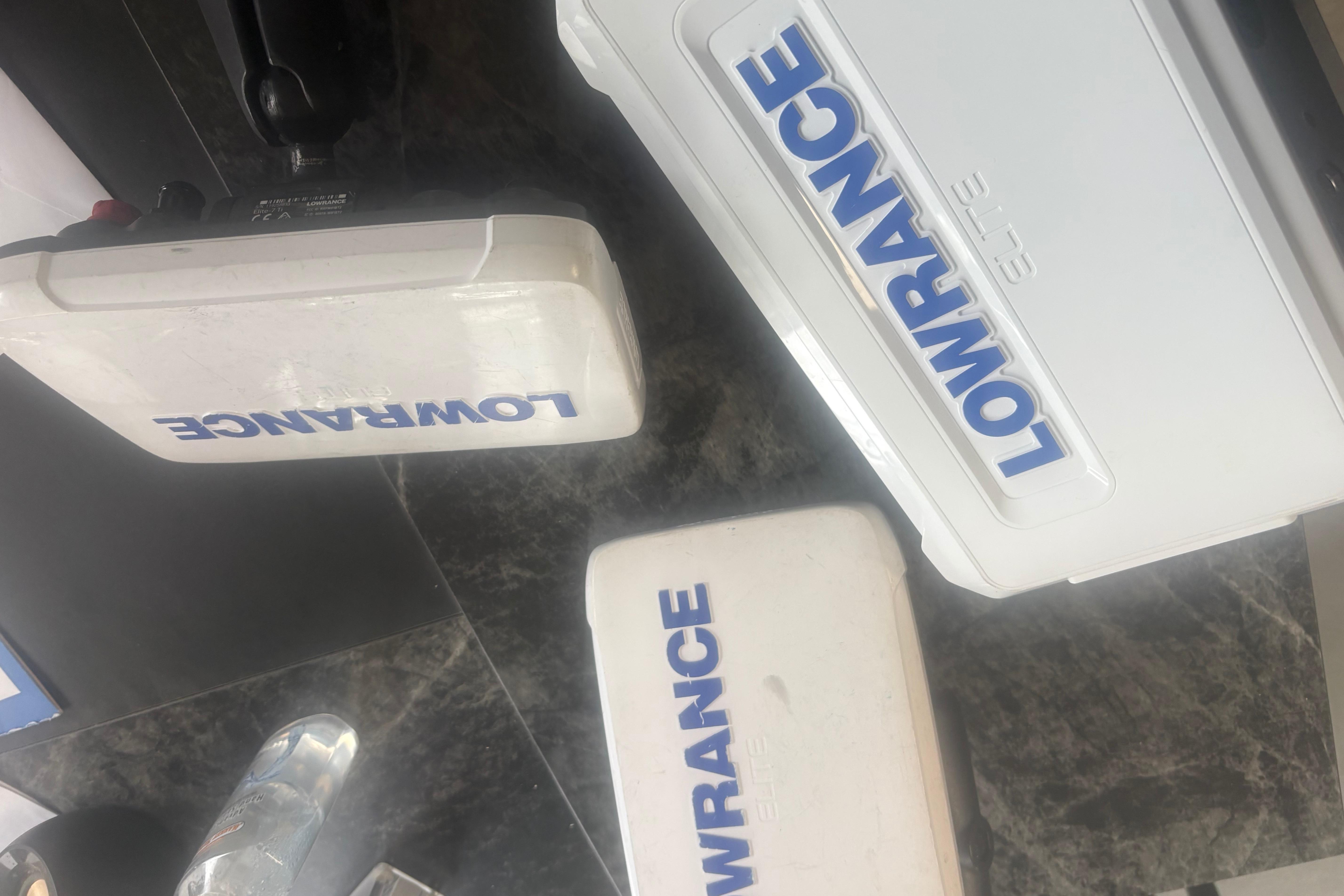 Lowrance Elite equipment on a Bass Tracker III Classic, 2020 model, displayed on a marble surface.