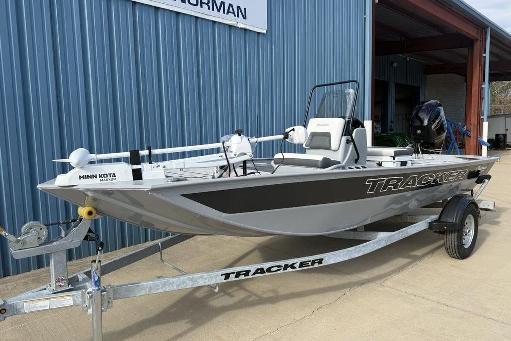 2026 Tracker Bass Tracker Classic CC boat on trailer, featuring Minn Kota Maxxum motor.