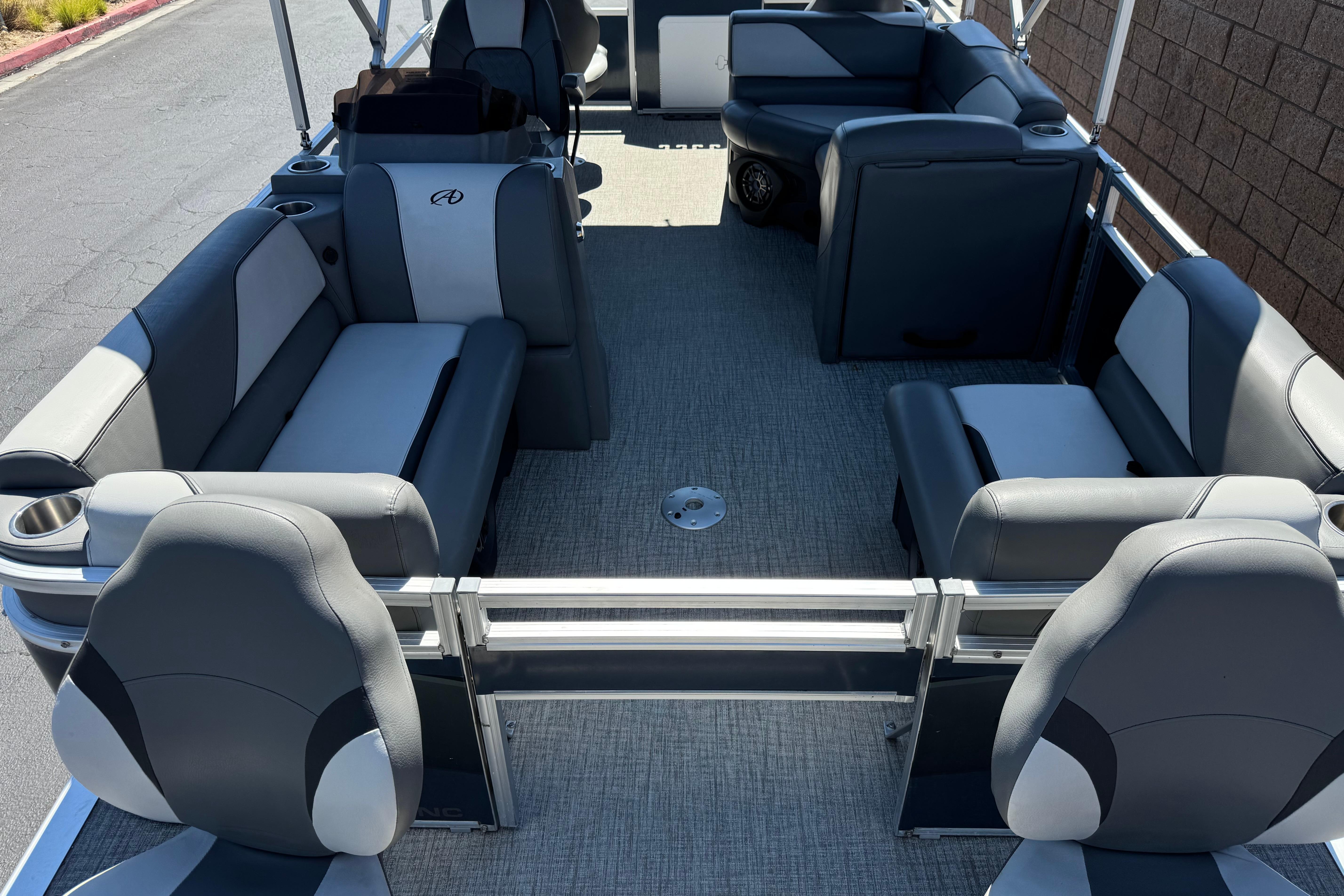 2023 Avalon Venture Fish N Cruise 20' pontoon boat interior with gray seating and carpet.