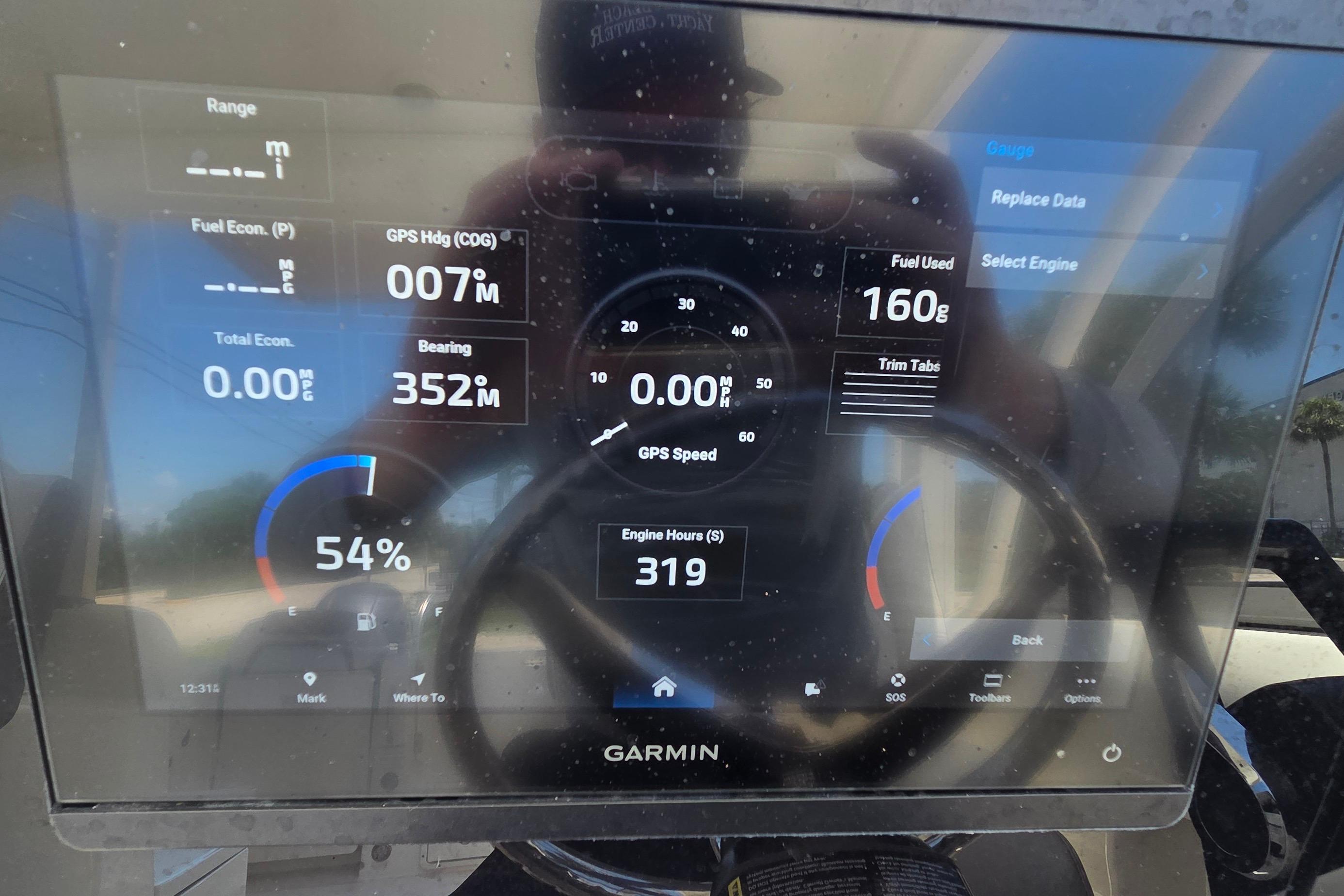 Garmin display on 2022 World Cat 255 DC showing navigation and fuel data.