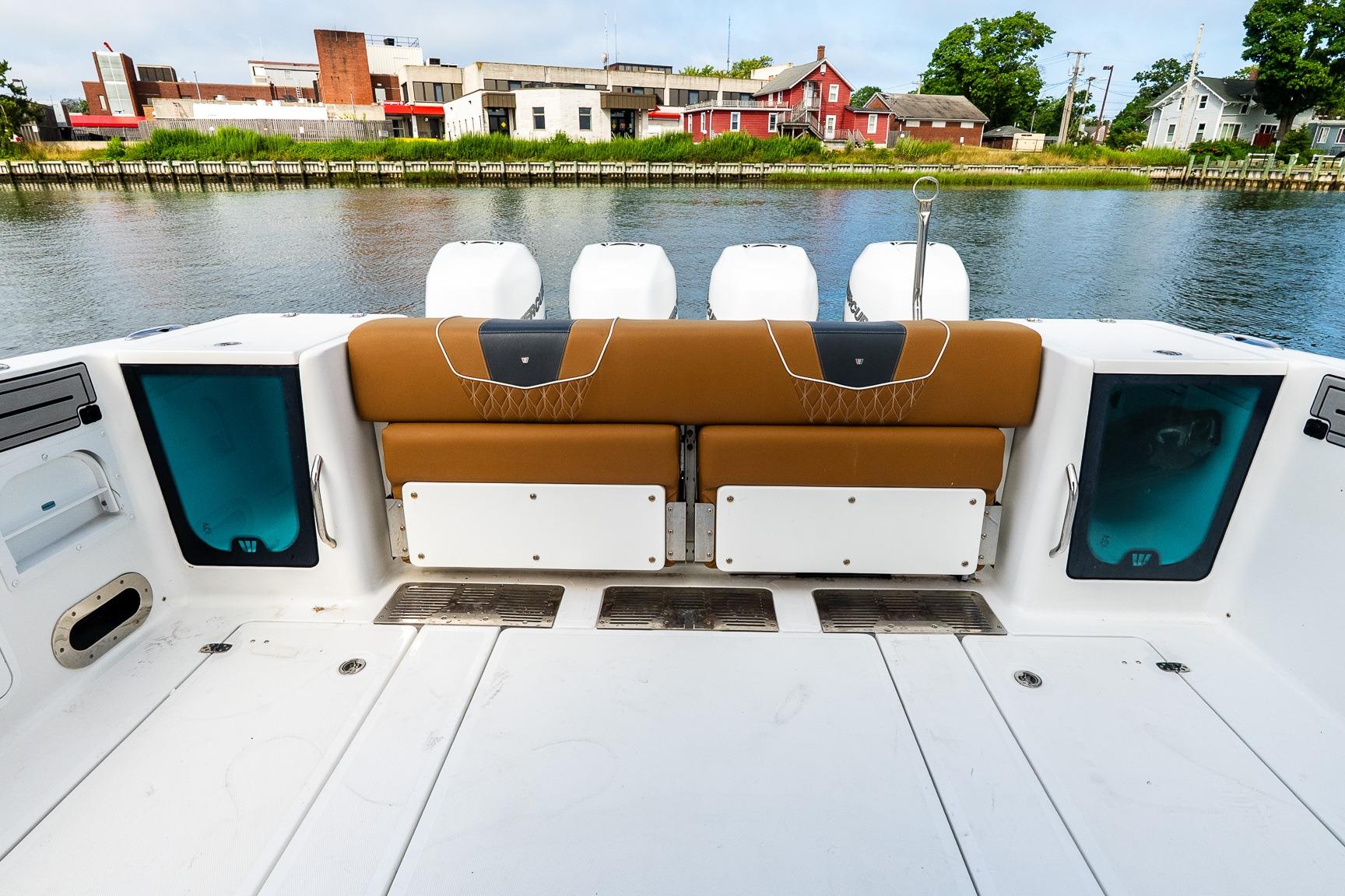 2021 Wellcraft 402 Fisherman boat interior with seating and water view.
